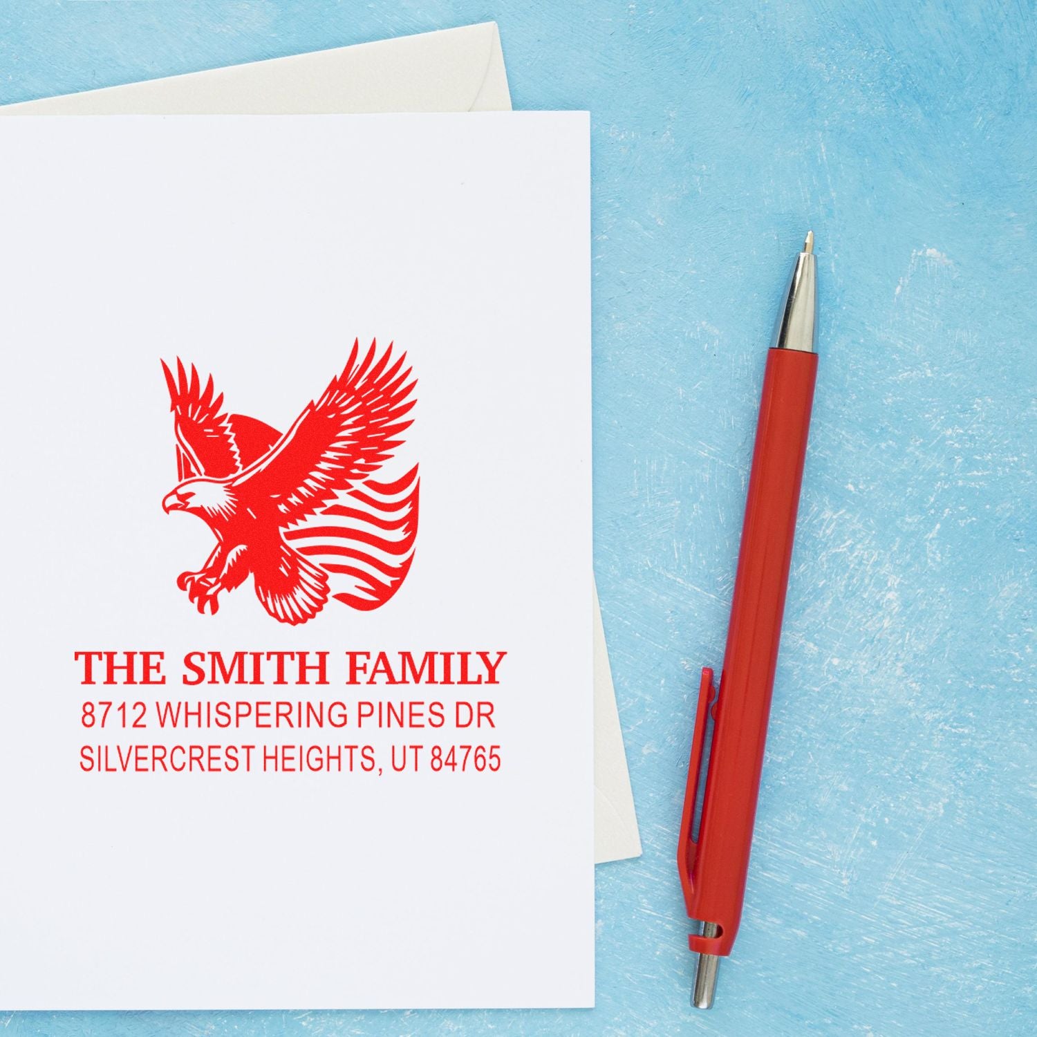 Personalized rubber stamp return address design with eagle graphic, Smith family name, and custom home address on white stationery for envelopes