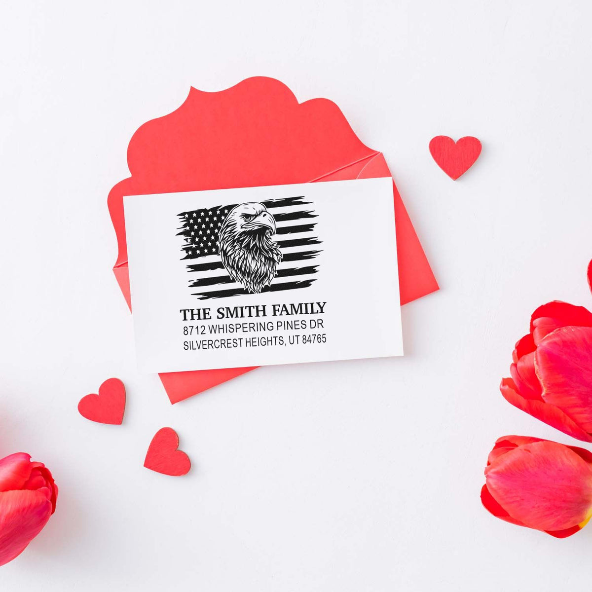 Custom self-inking address stamp with eagle and distressed American flag design, personalized family name and return address for mailings