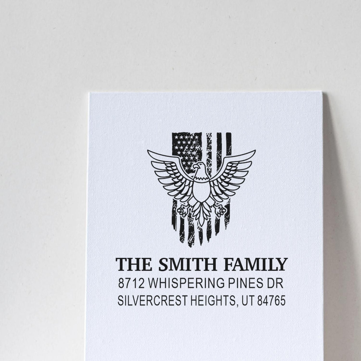 Custom rubber address stamp with patriotic eagle and distressed American flag design, personalized for The Smith Family, Silvercrest Heights UT 84765