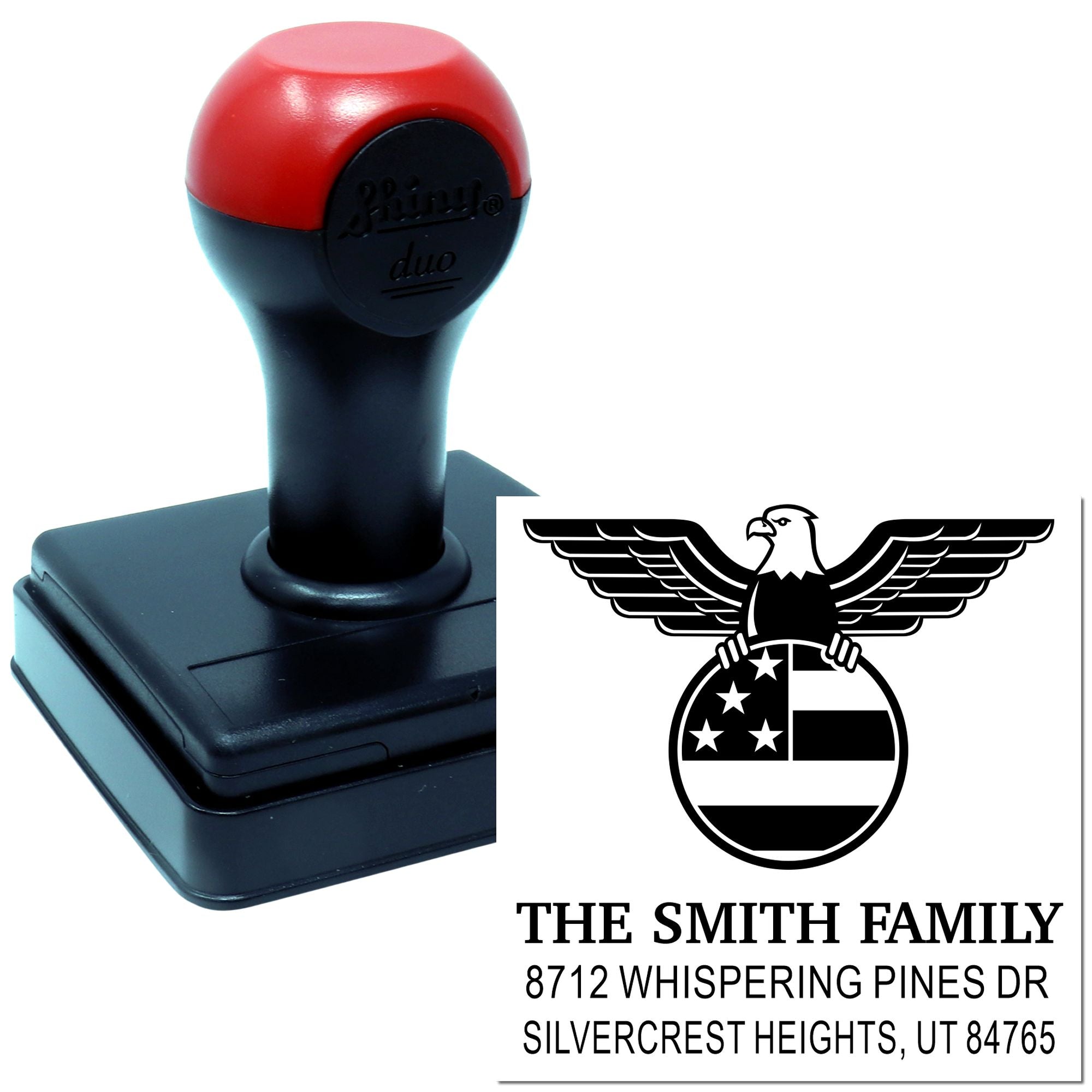 Custom self-inking rubber stamp with eagle crest and family name address block, ideal for personalized mailing, return address, and stationery use.