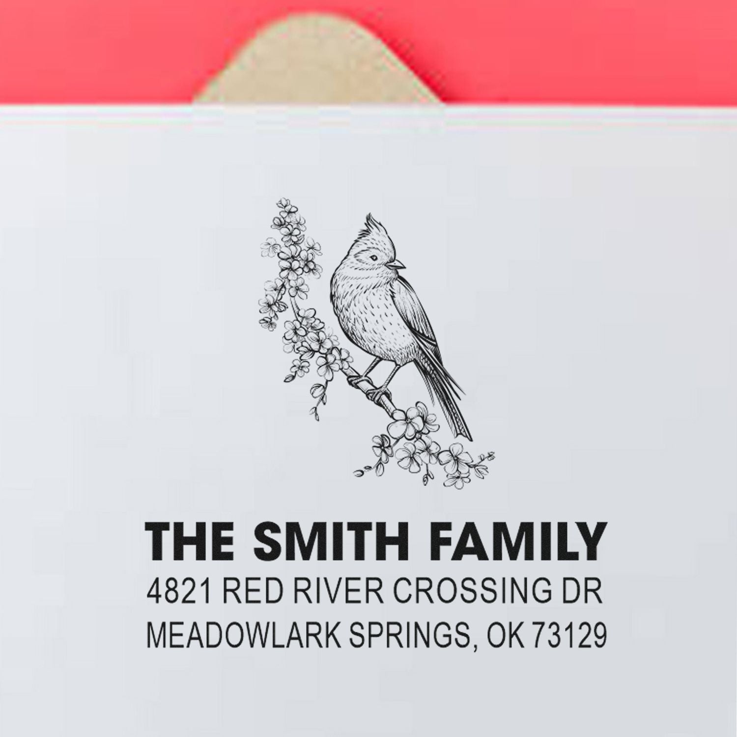 Custom return address rubber stamp with cardinal and floral branch, The Smith Family, 4821 Red River Crossing Dr, Meadowlark Springs, OK 73129.