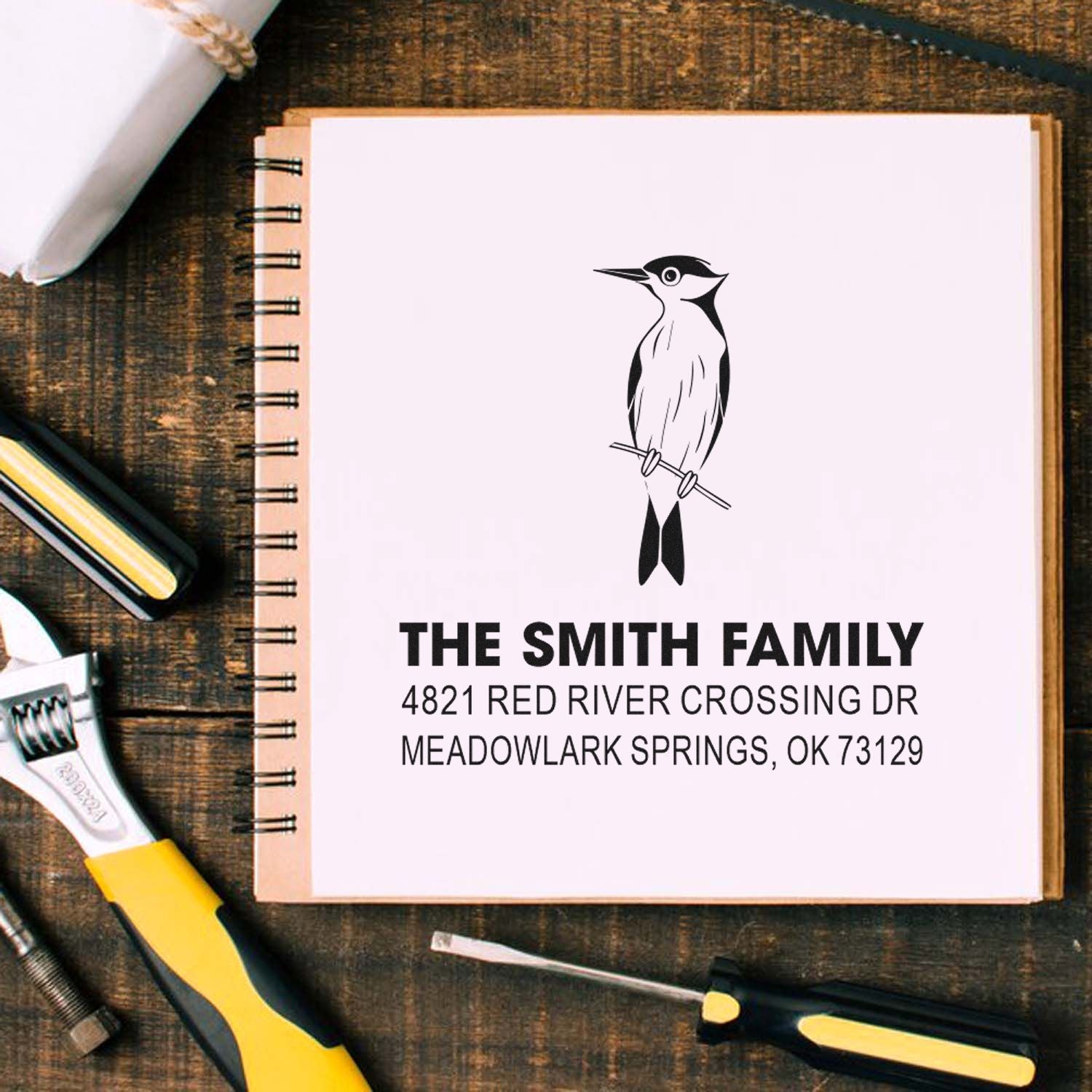 Custom family address rubber stamp with bird logo, Smith Family name, and return address for personalized mailing, envelopes, and stationery.