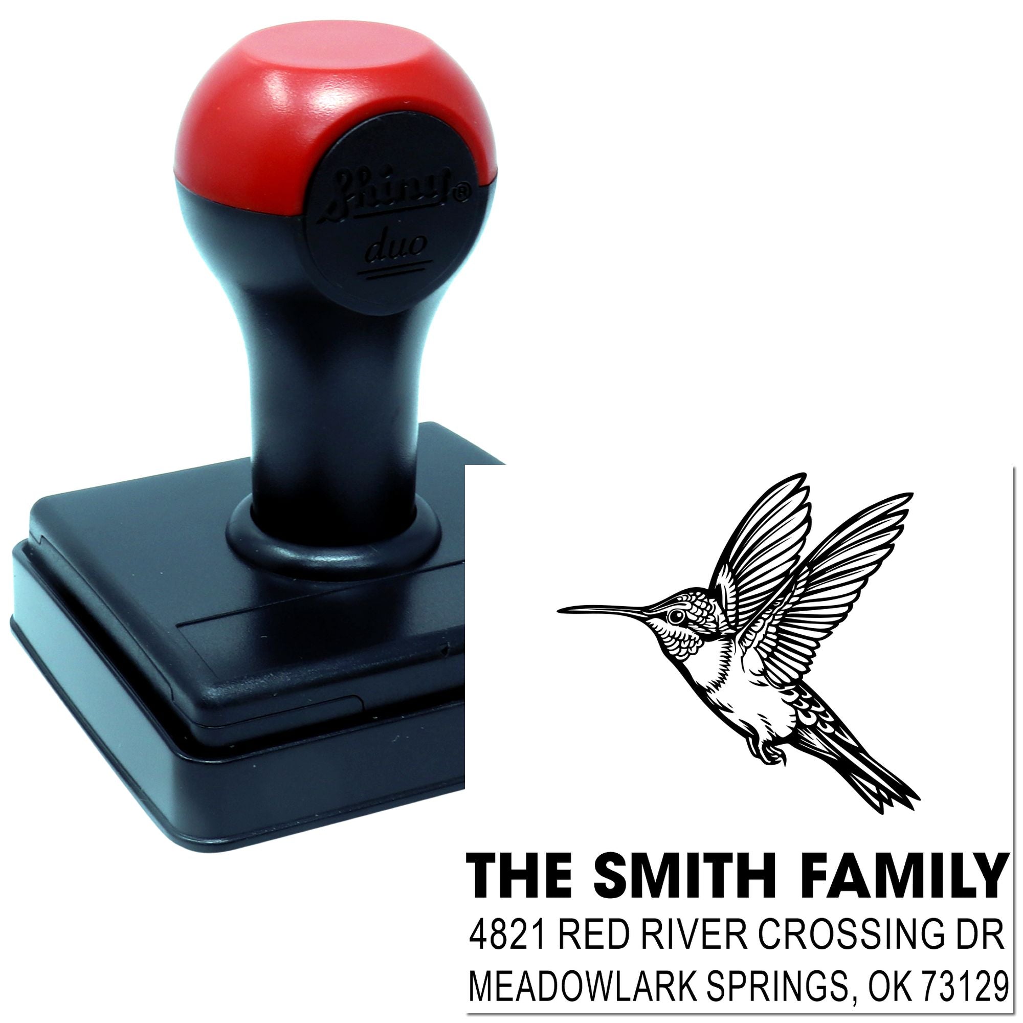 Custom self-inking rubber stamp with hummingbird design, The Smith Family name, and address for personalized return envelopes and mailings.