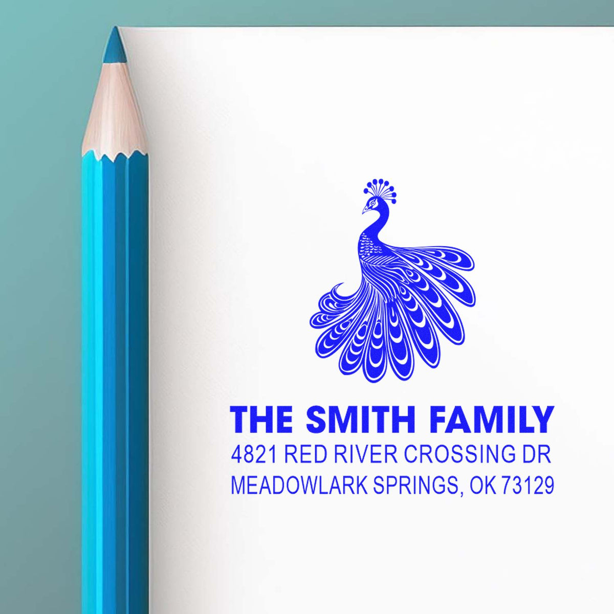 Custom peacock address rubber stamp for The Smith Family with street address and Meadowlark Springs, OK 73129 in blue ink for mailing and invitations