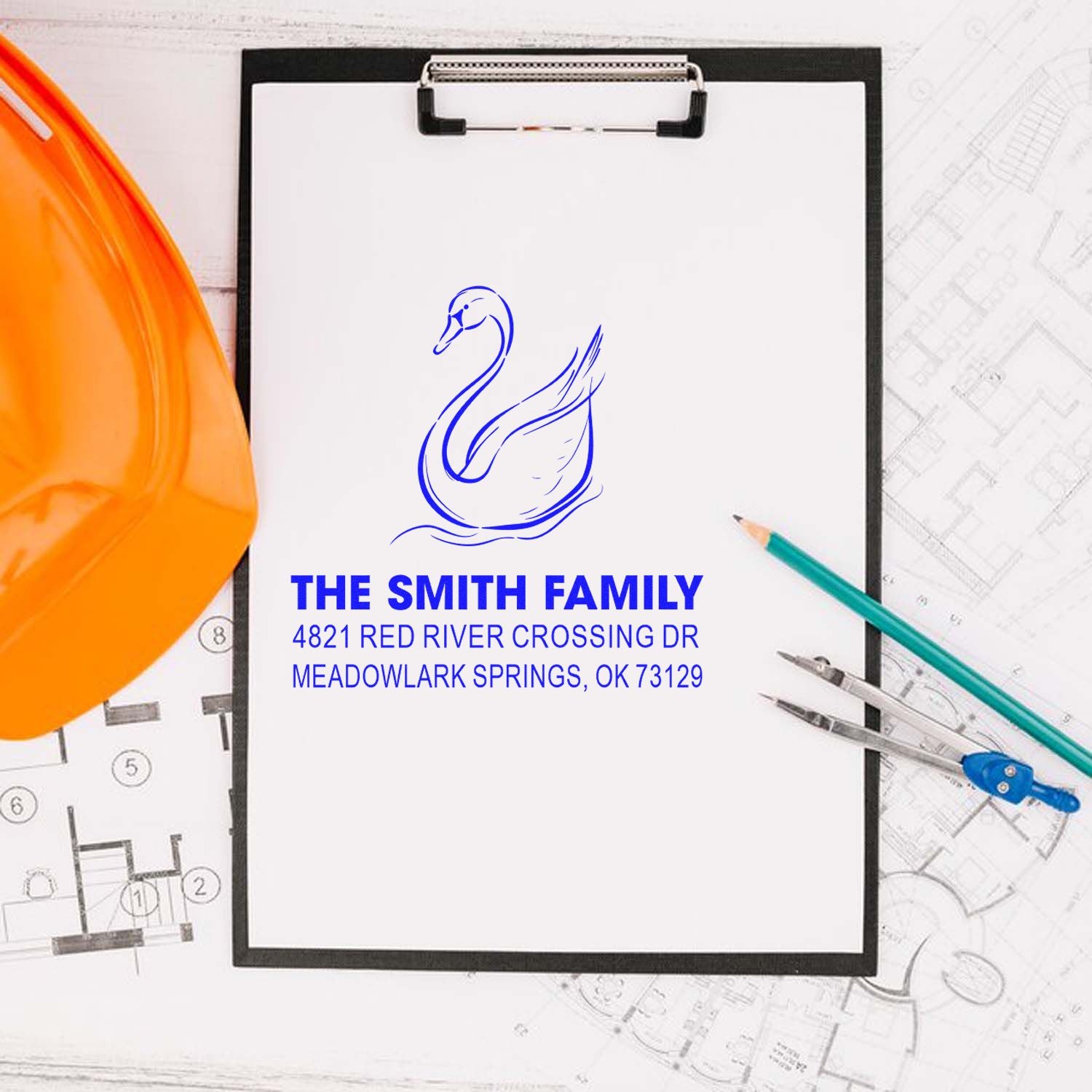 Custom rubber stamp with swan logo, The Smith Family name, and return address for personalized mail, stationery, and office paperwork.