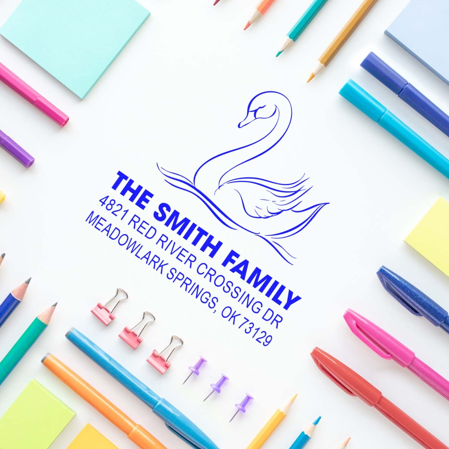 Custom rubber address stamp with swan logo and return address for The Smith Family, ideal for wedding invitations, envelopes and home mailing.