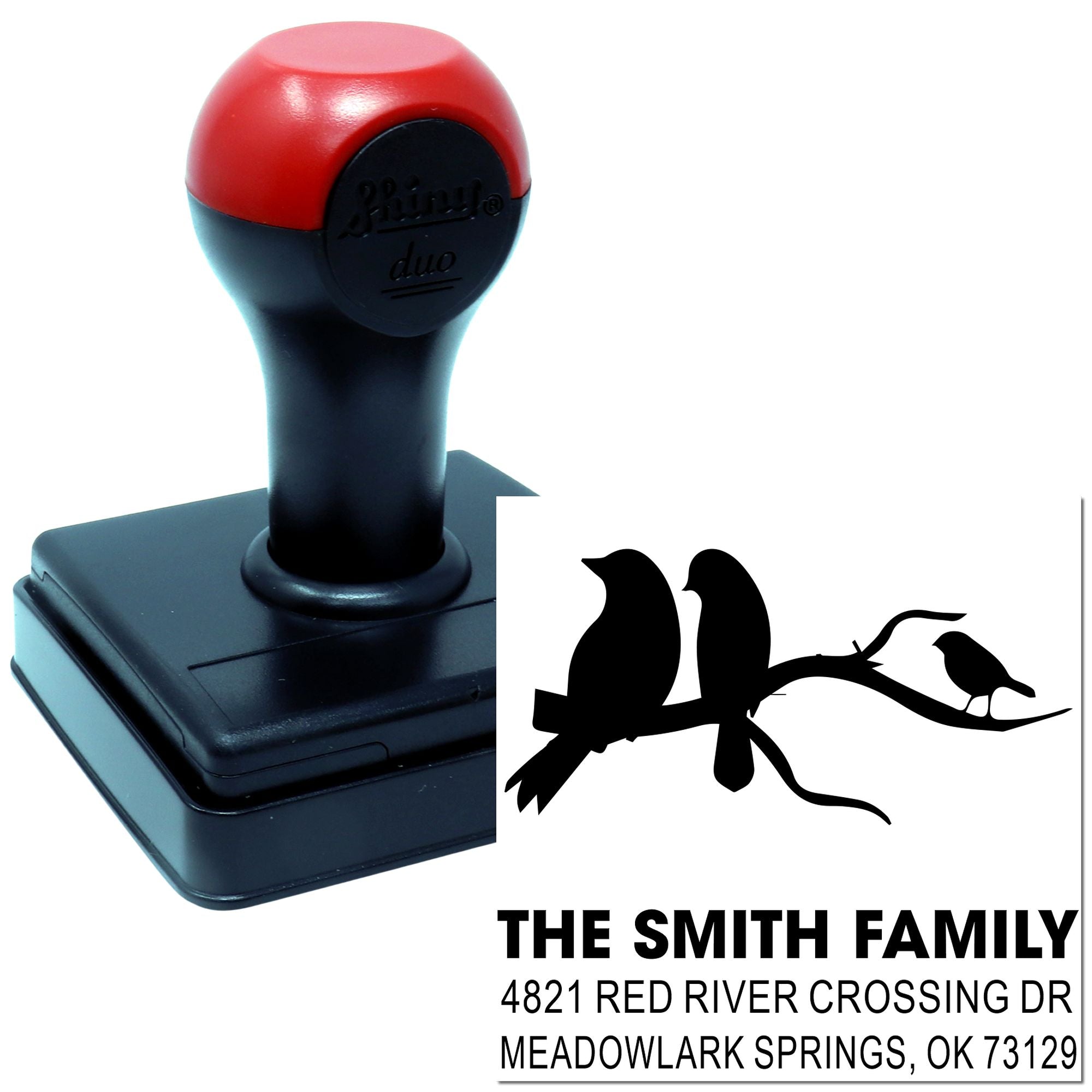Custom self-inking rubber address stamp with bird design, family name and return mailing address, ideal for personalized envelopes and documents.