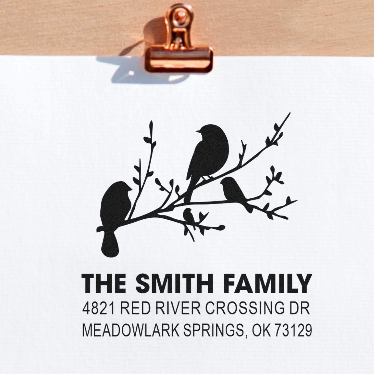 Custom rubber return address stamp with birds on branch design, featuring The Smith Family and Meadowlark Springs, OK 73129.
