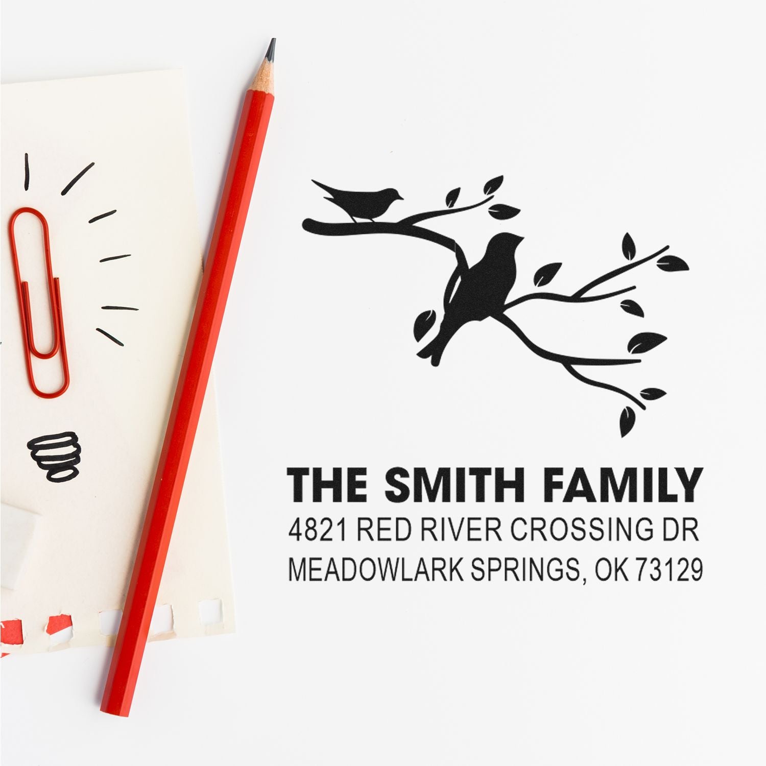 Custom family return address rubber stamp with bird on branch design for mail, featuring The Smith Family name and personalized address text