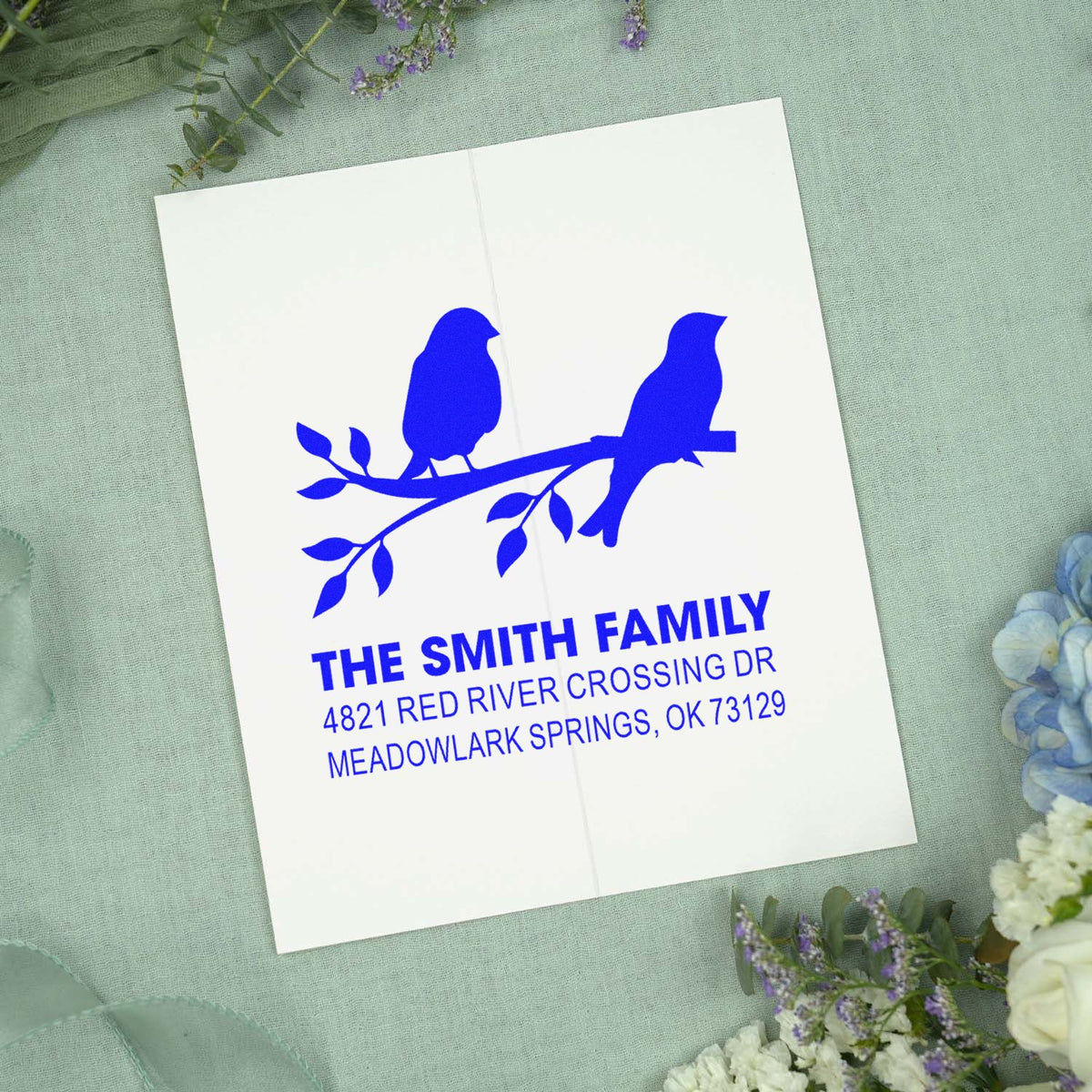 Custom address rubber stamp with two birds on a branch, featuring The Smith Family return address for weddings, mailings, and personalized branding.