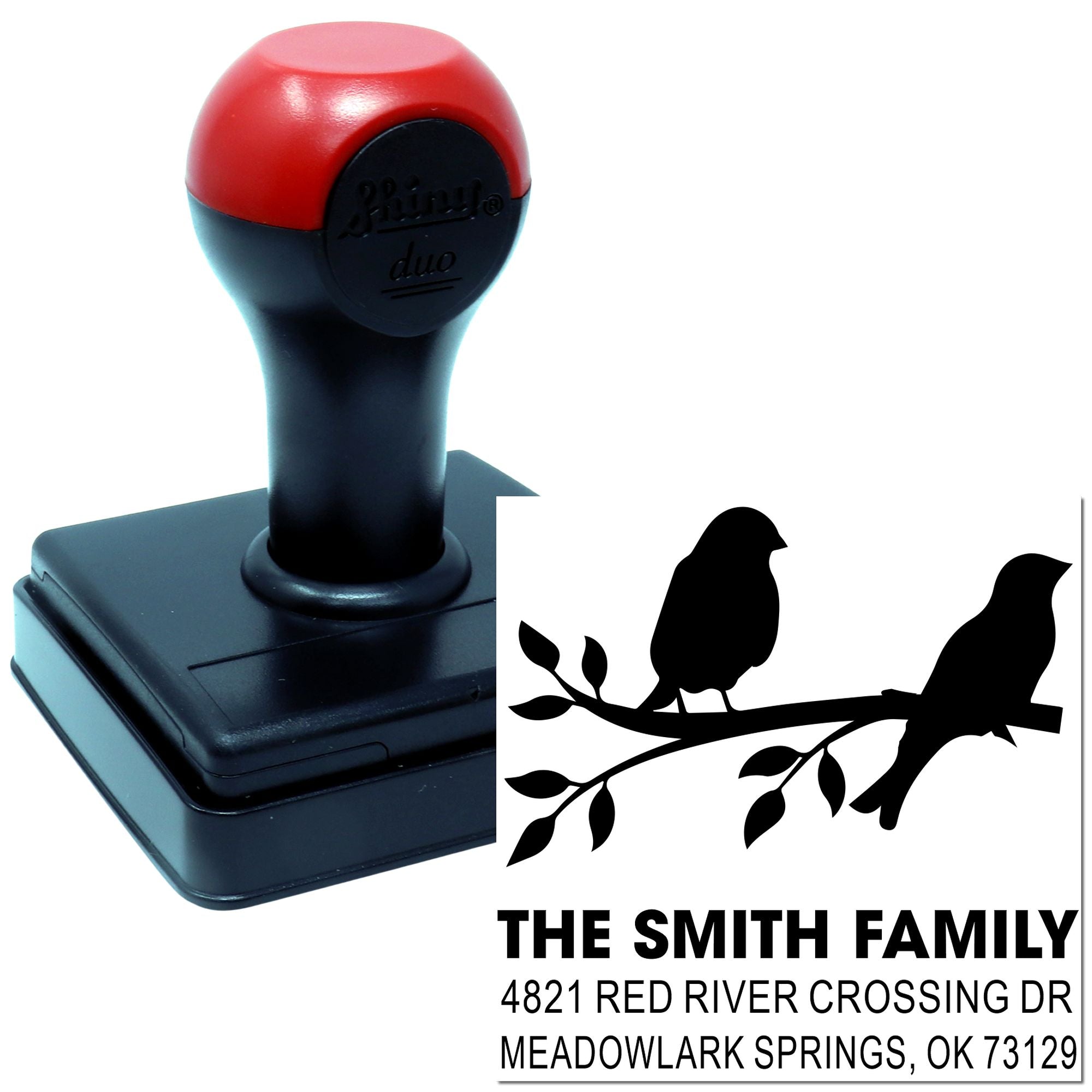 Custom self-inking rubber address stamp with bird branch design, The Smith Family name, and return address for personalized home mailing.
