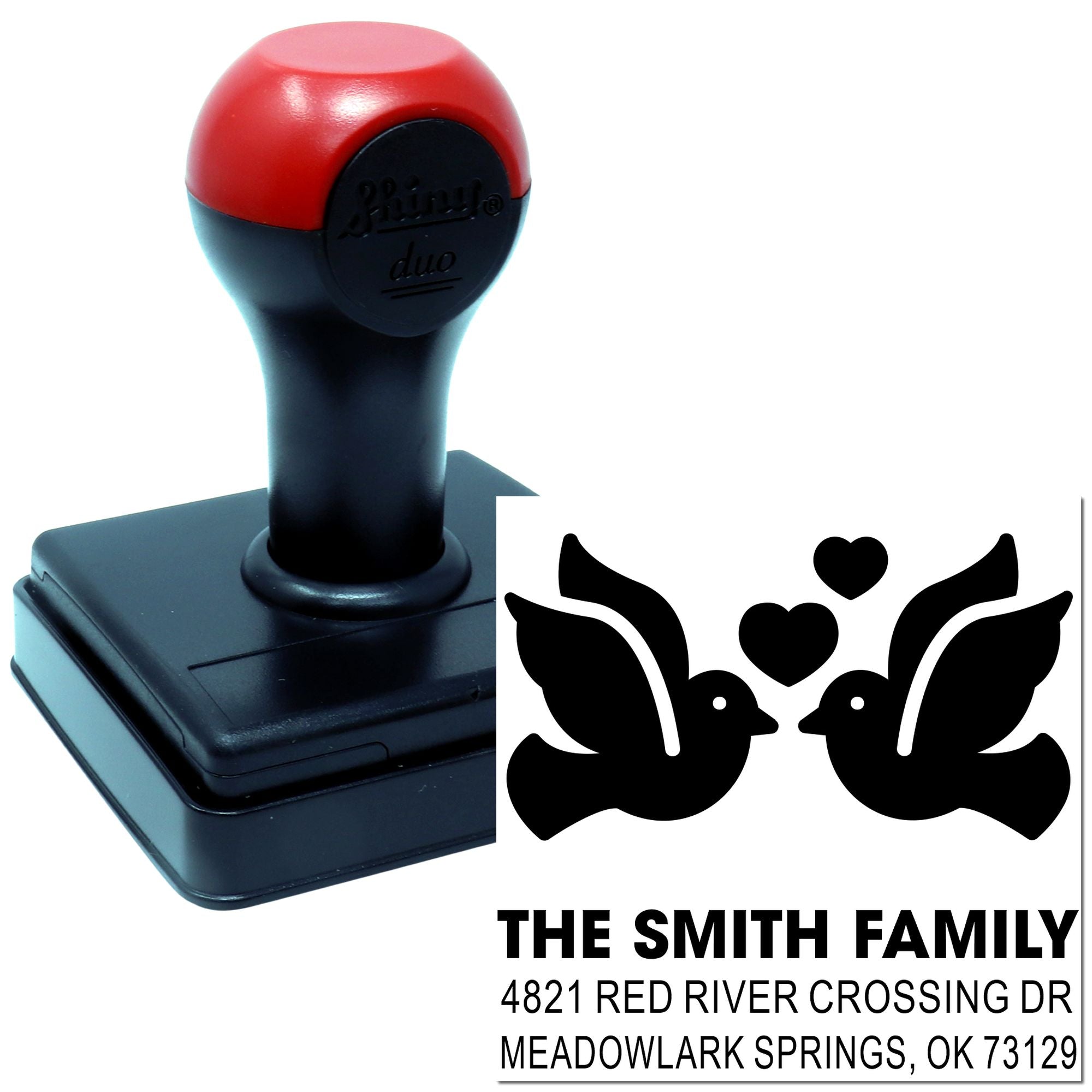 Custom self-inking rubber address stamp with birds and hearts design, featuring The Smith Family and Meadowlark Springs, OK return address.
