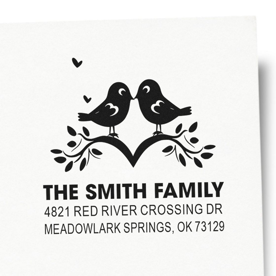 Custom rubber address stamp with kissing birds and heart branch design, personalized with The Smith Family name and Meadowlark Springs, OK address