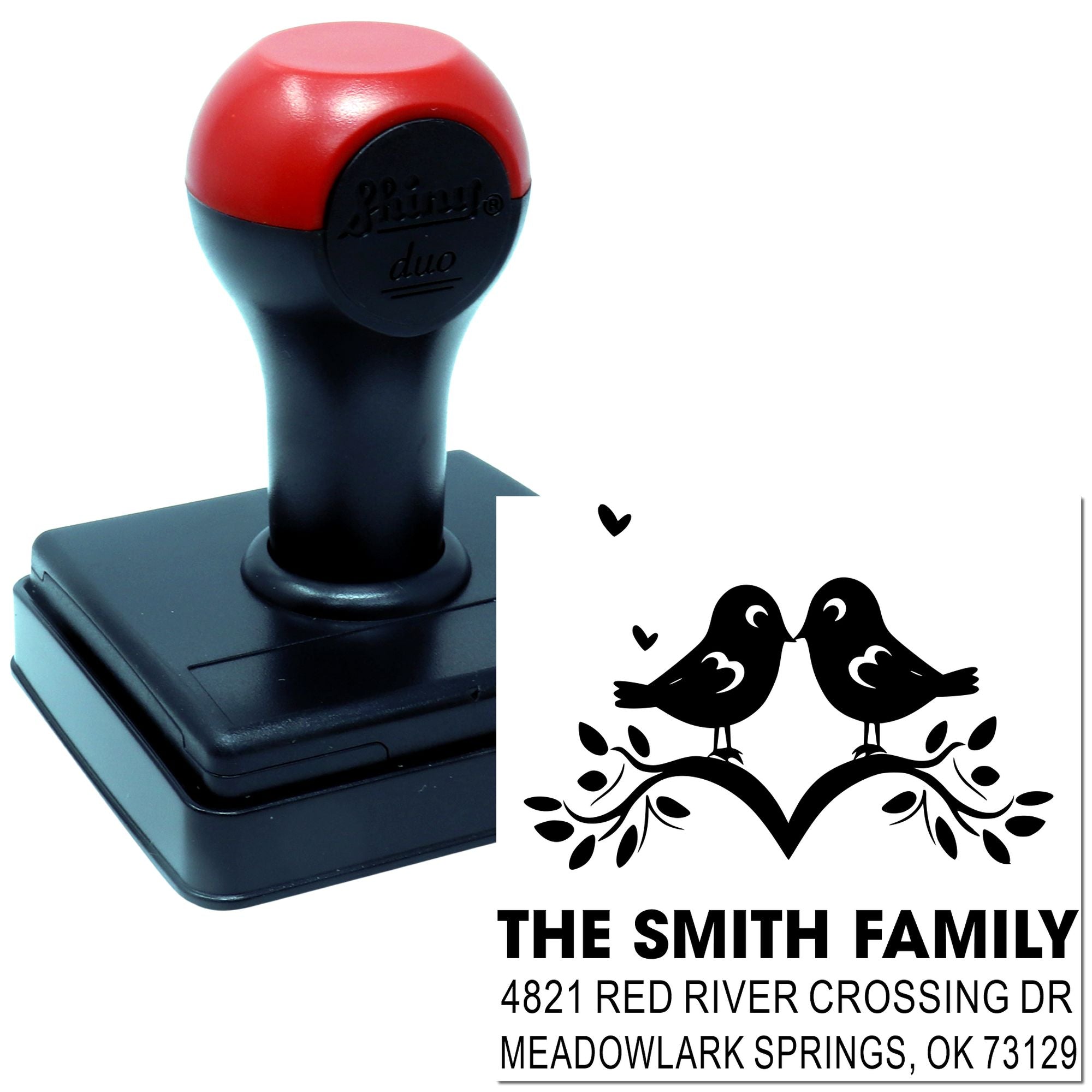 Custom self-inking rubber stamp with lovebirds design and personalized family name, address, and city for wedding or home mailing use