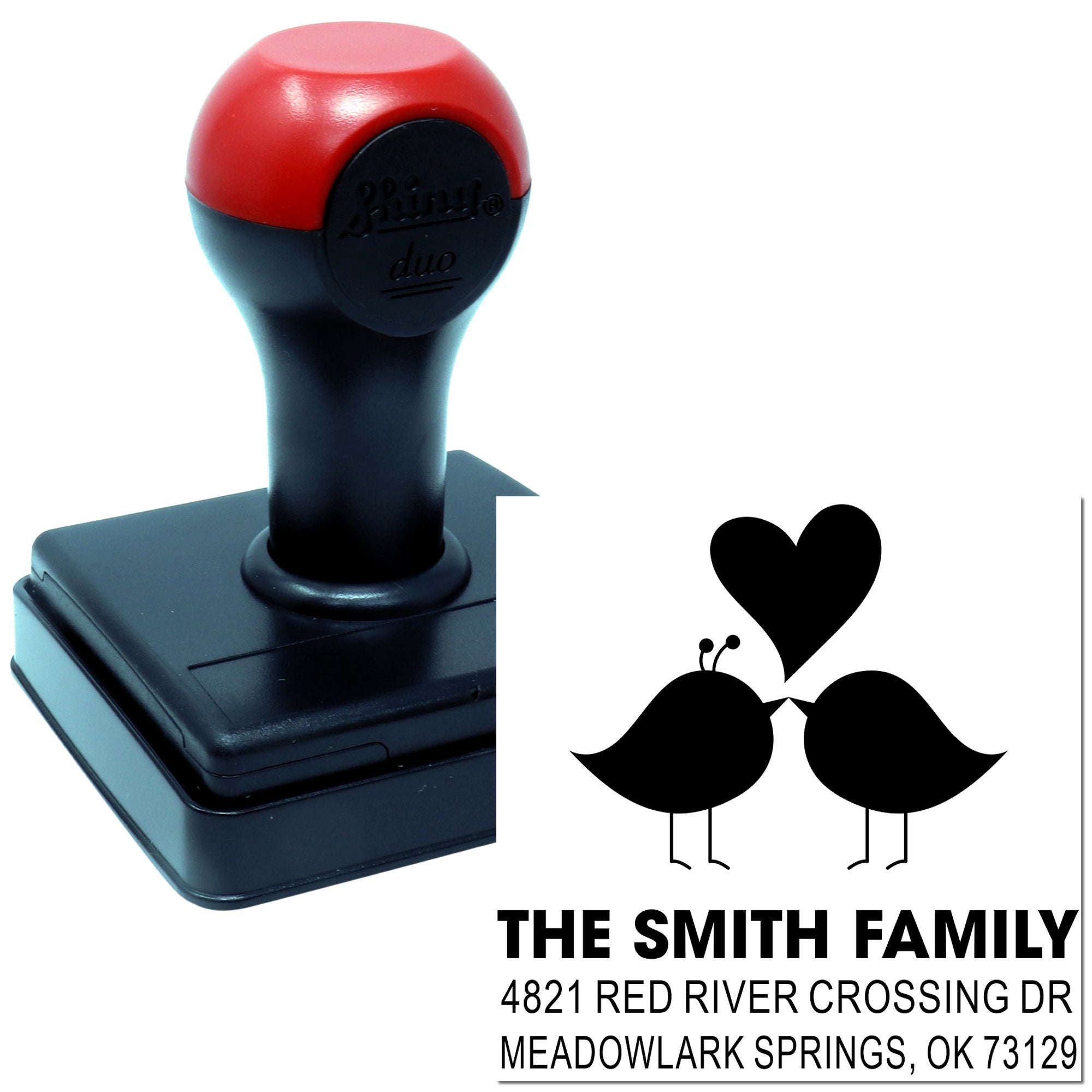 Custom self-inking rubber address stamp with heart and bird design, personalized family name and return mailing address for envelopes and cards.