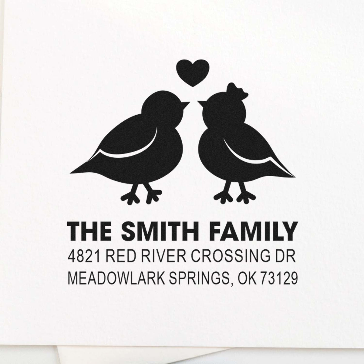 Custom return address rubber stamp with two birds and heart design, personalized Smith family name, street address, and Meadowlark Springs, OK 73129