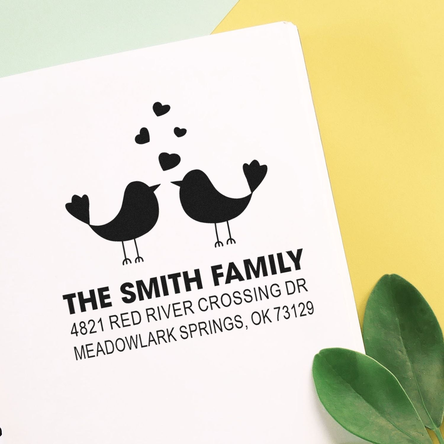 Custom return address rubber stamp with two birds and hearts, featuring family name and address for wedding, stationery, or envelope labeling.