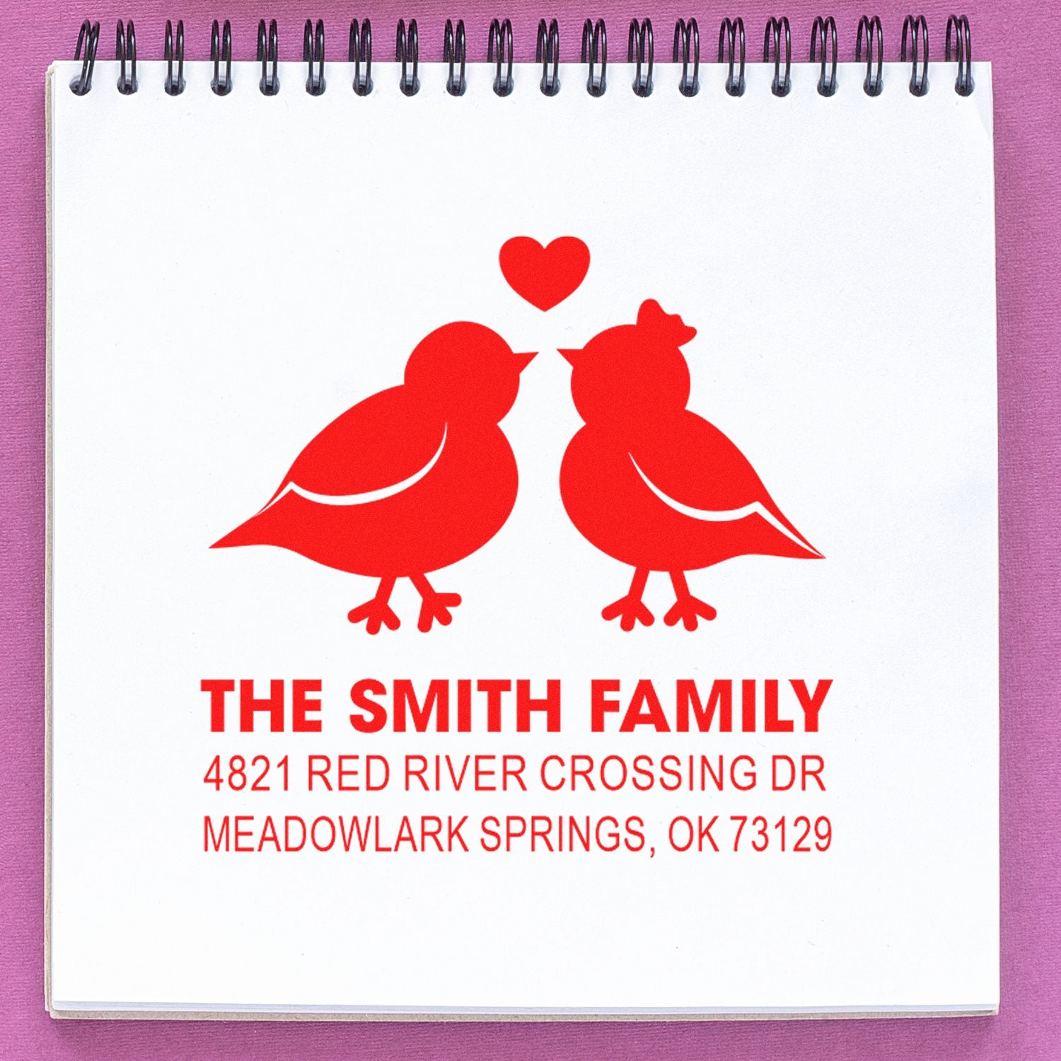 Custom rubber address stamp with two lovebirds and heart, featuring The Smith Family name and Meadowlark Springs, OK return address.
