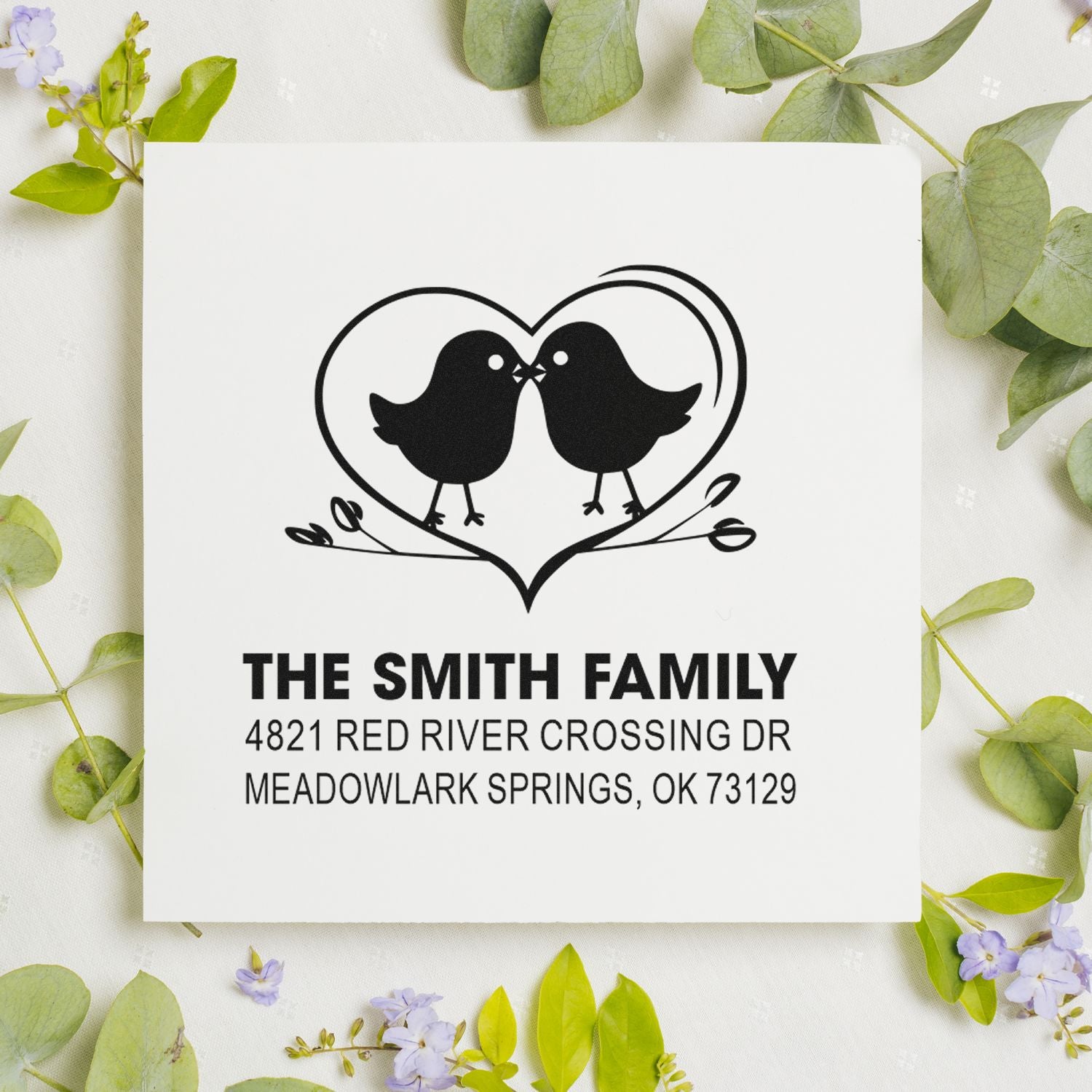 Custom rubber address stamp with two birds in a heart design, The Smith Family name and return address for wedding or home mailing use.