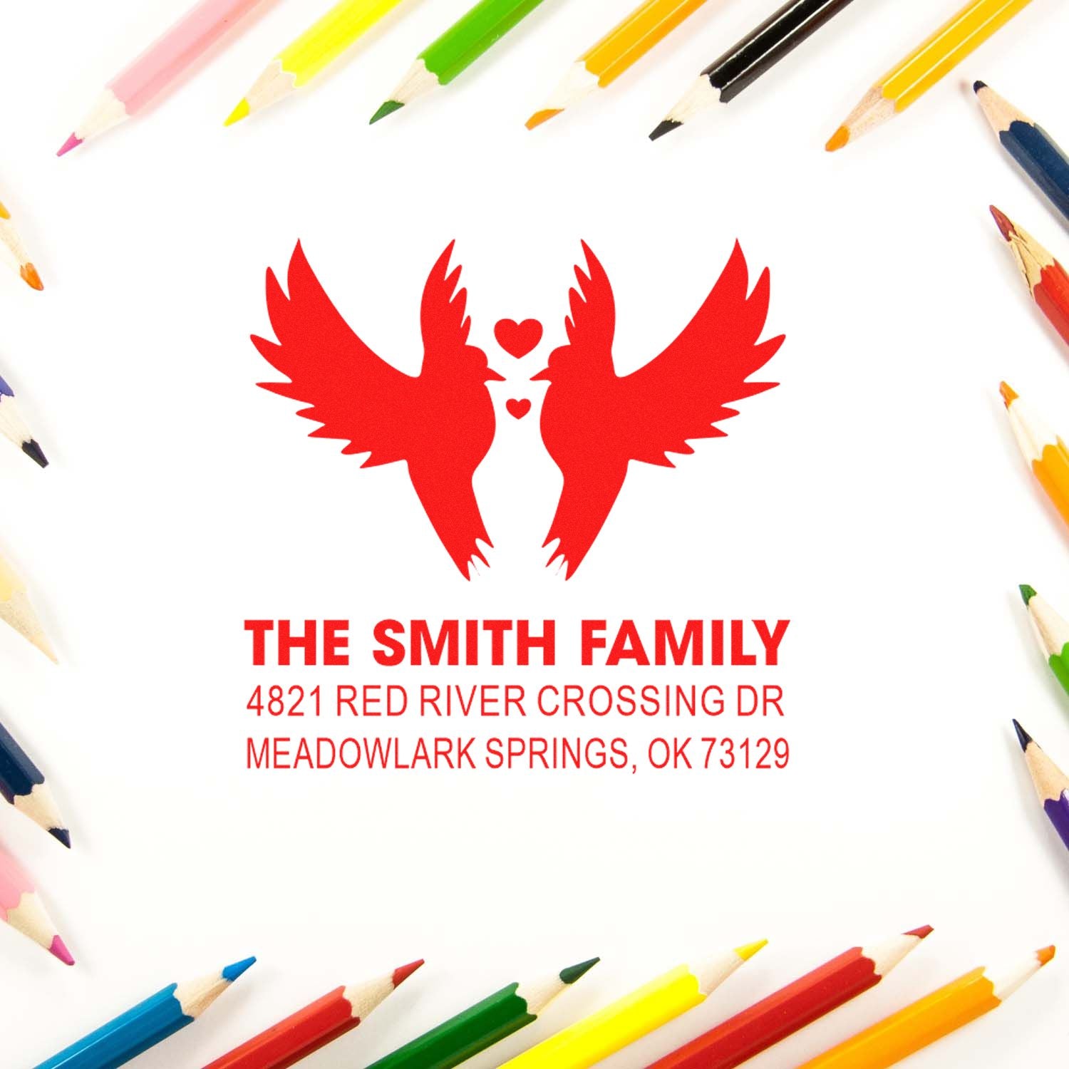 Custom rubber stamp with twin bird logo, The Smith Family name, and return address for personalized mail, envelopes, business, and packaging.