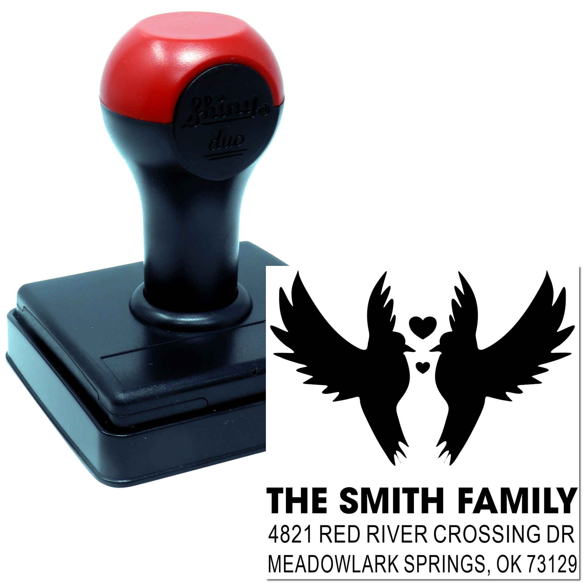 Custom self-inking rubber stamp with swan heart design, family name, and return address for wedding invitations and home mailings