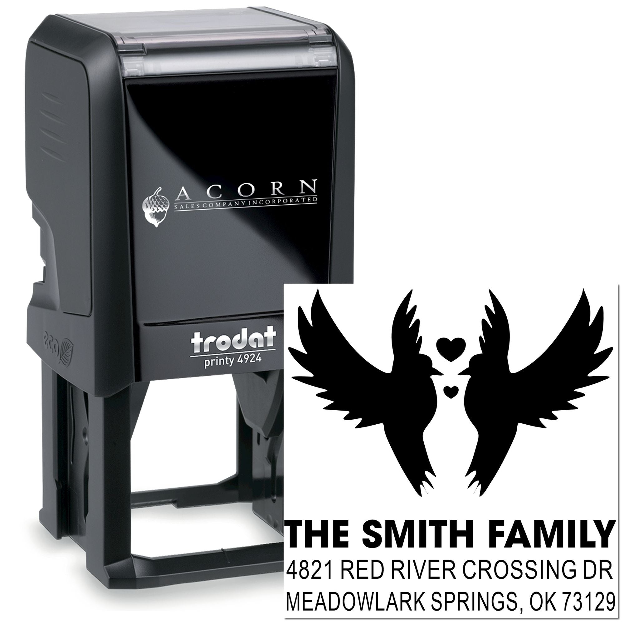 Custom self-inking rubber stamp with winged heart design and family return address, ideal for personalized mailing labels and home stationery