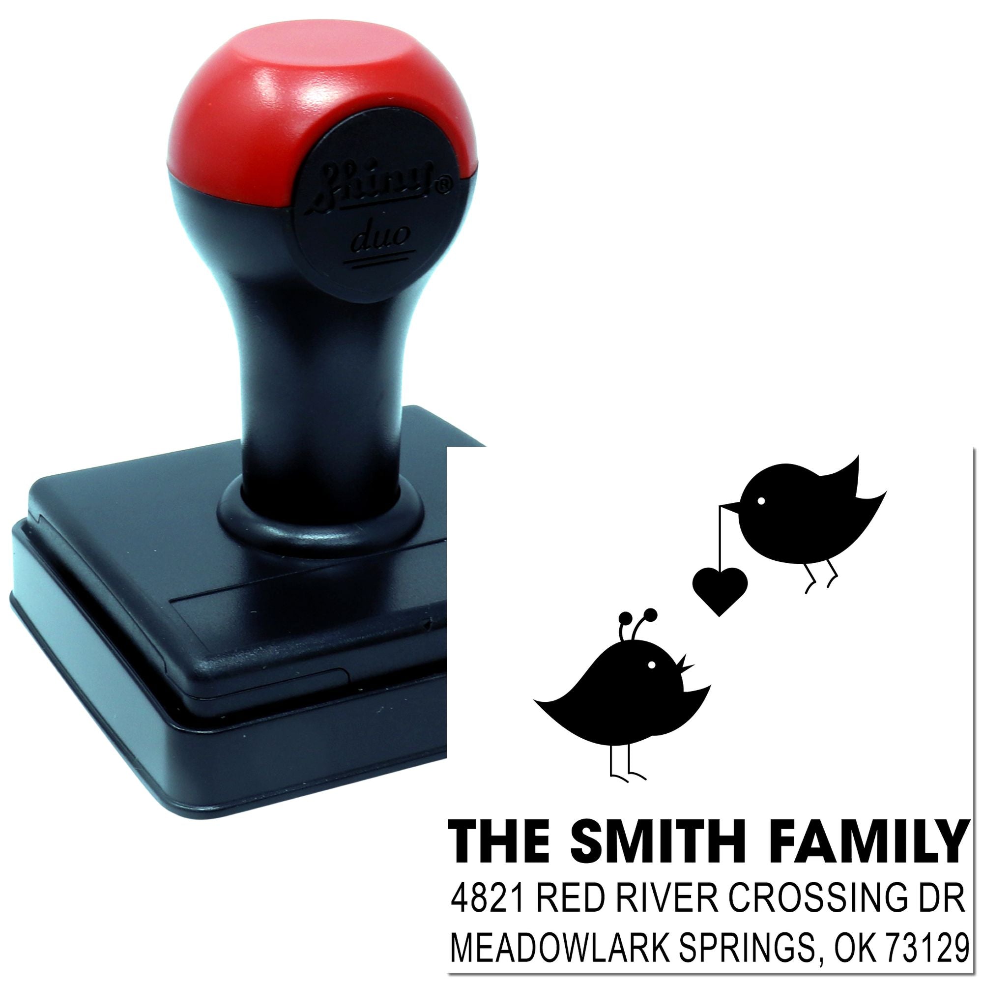 Custom self-inking rubber stamp with family address design, birds and heart motif, black handle and red top for personal mailing use