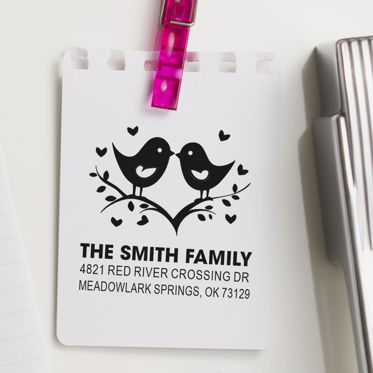 Custom self-inking address stamp with two birds and heart branch design, personalized with The Smith Family name and Meadowlark Springs, OK address.
