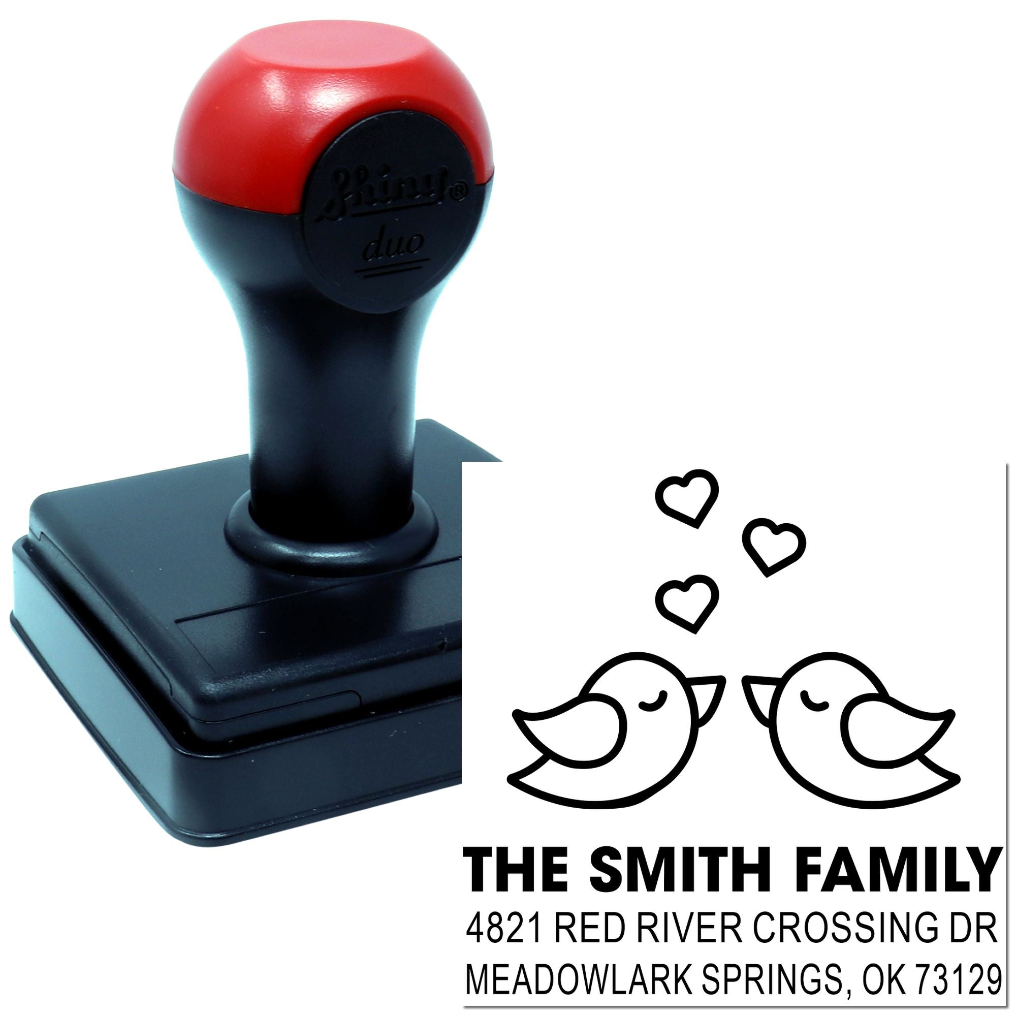 Custom self-inking rubber address stamp with romantic bird design, The Smith Family name, and Oklahoma return address, red and black handle