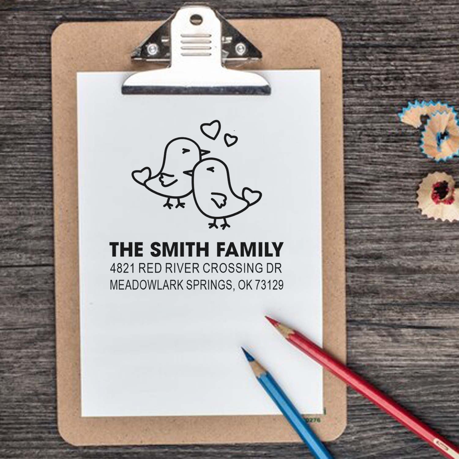 Custom bird couple return address rubber stamp with heart accents, personalized family name and mailing address for envelopes, cards, and wedding mail.