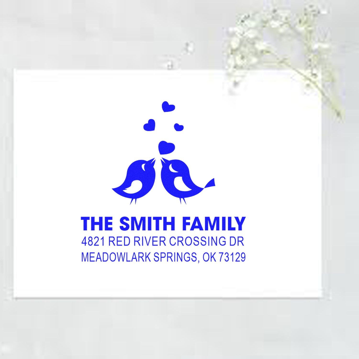 Custom blue rubber address stamp with bird and heart design, personalized Smith Family return address for envelopes, mail, and home stationery.