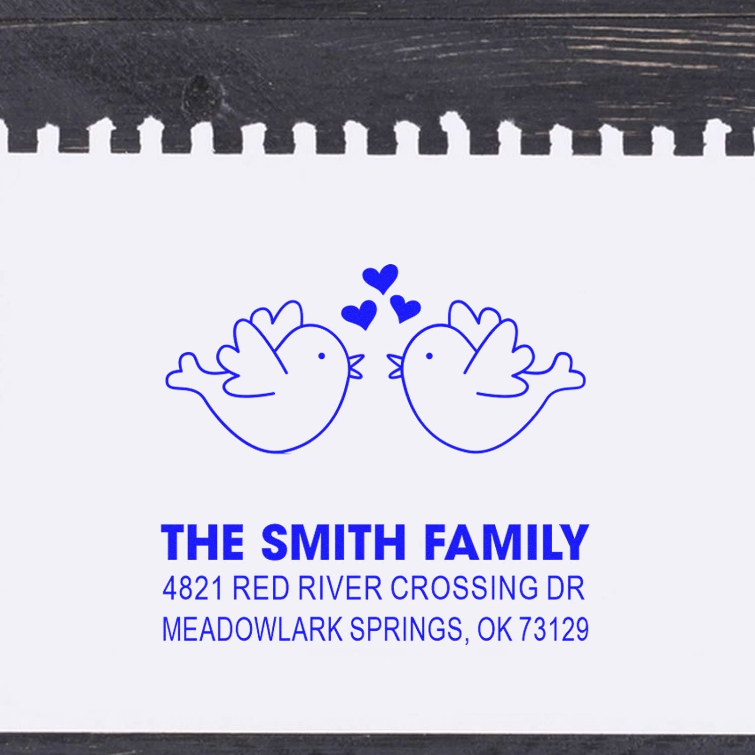 Custom rubber address stamp with two birds and hearts design, featuring The Smith Family name and Meadowlark Springs, OK return address.