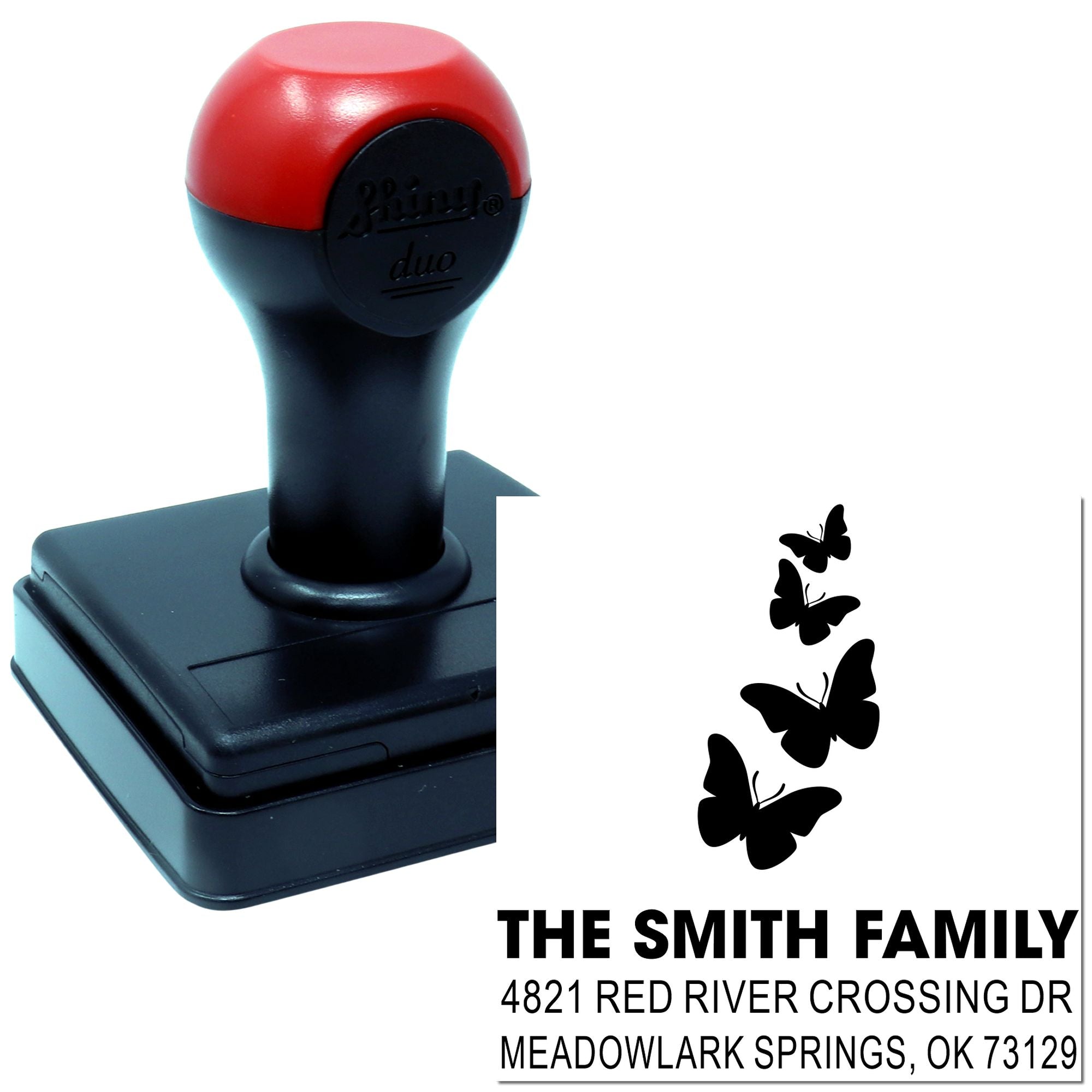 Custom self-inking rubber address stamp with butterfly design for The Smith Family, featuring Meadowlark Springs, OK personalized mailing return address.