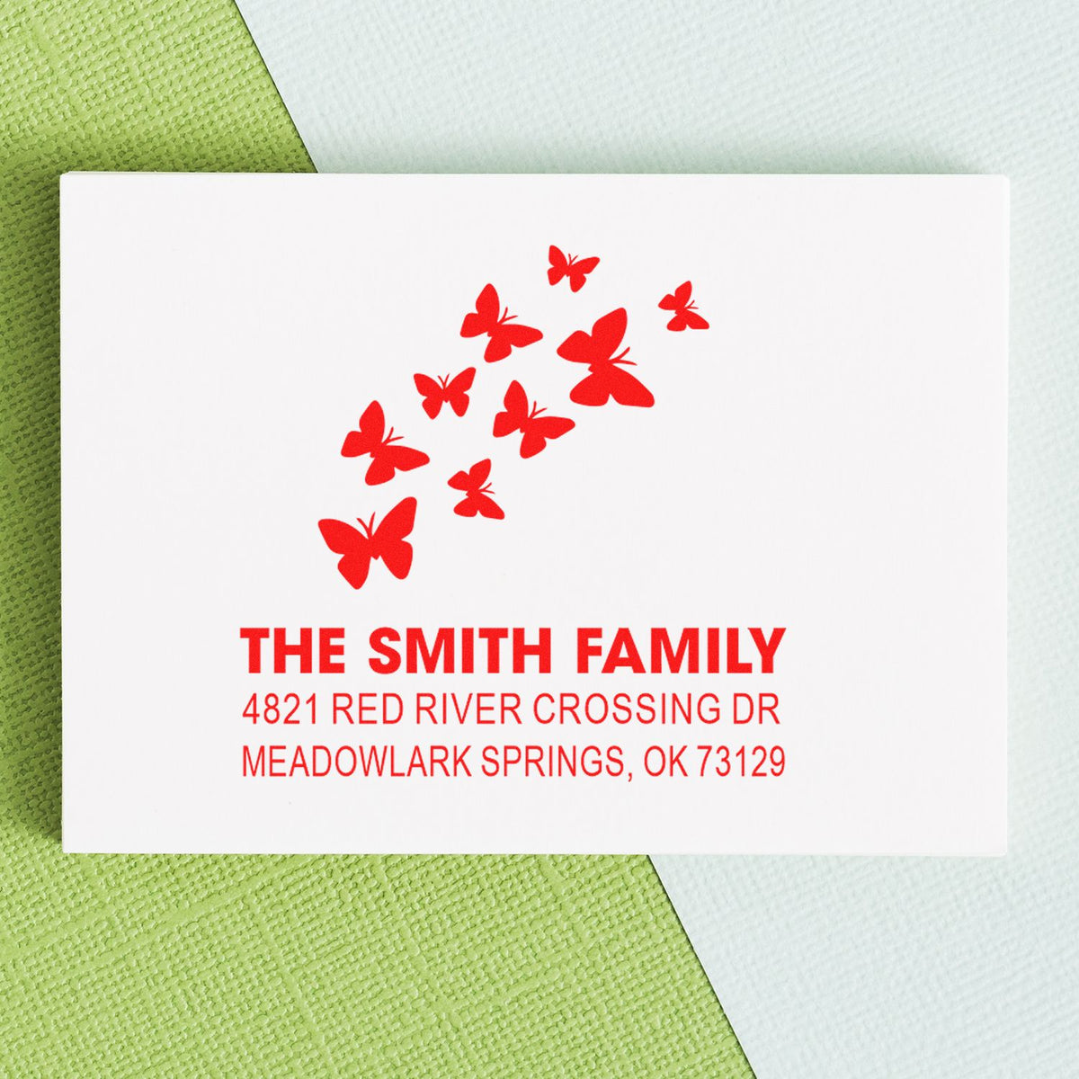 Personalized butterfly family return address rubber stamp with red butterflies, The Smith Family, and Meadowlark Springs, OK mailing address design.