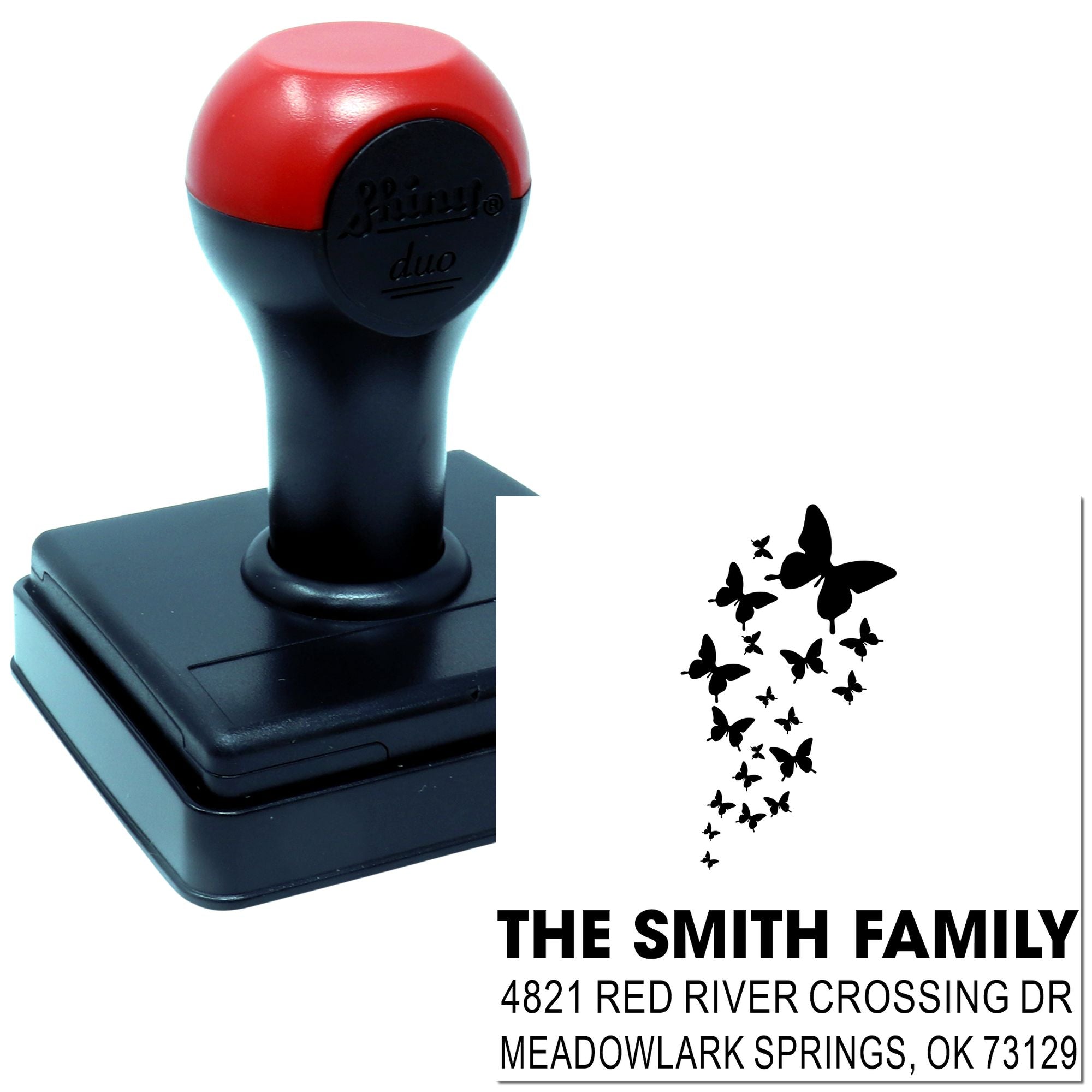 Custom self-inking rubber stamp with butterfly design and personalized return address for The Smith Family, ideal for mailing and home organization.