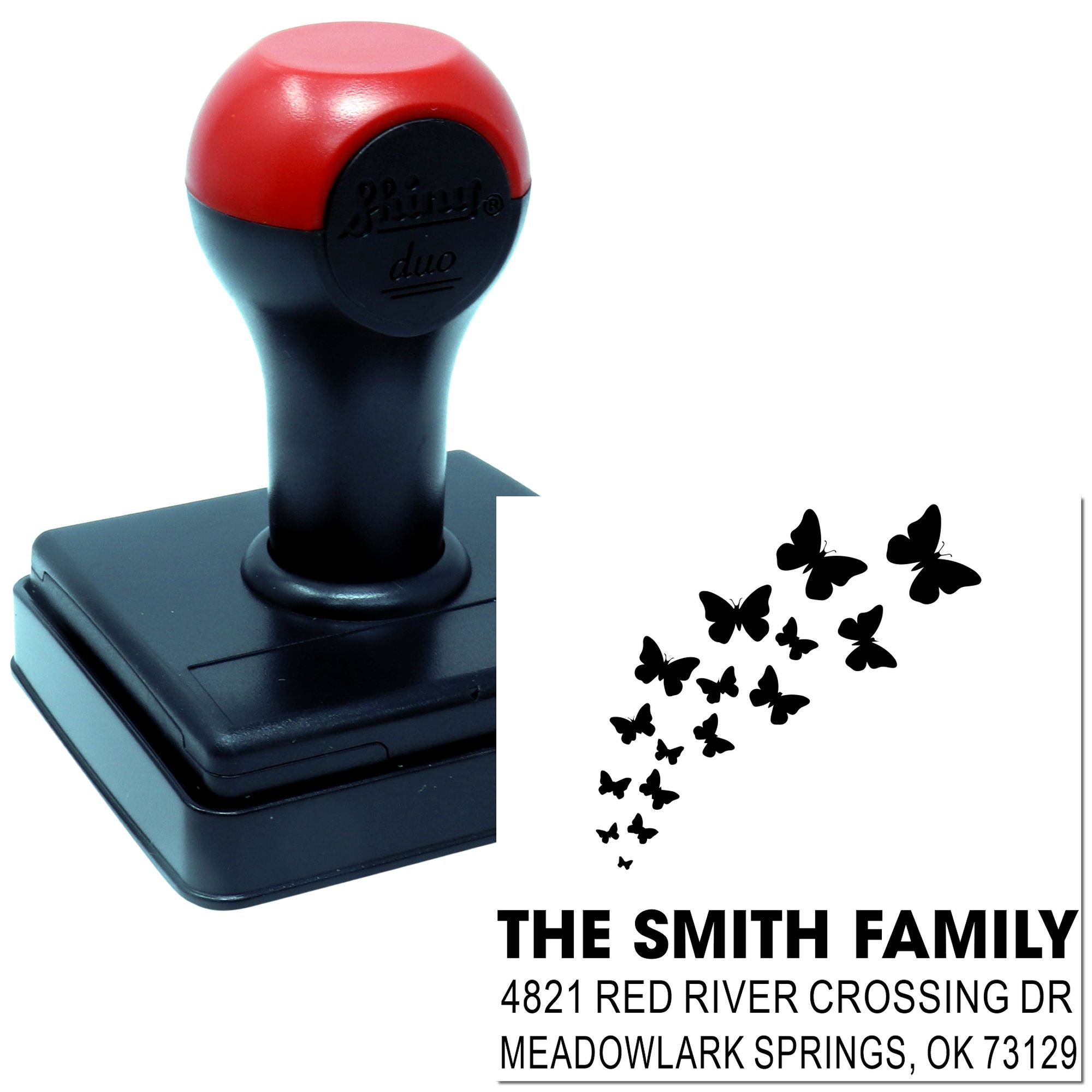 Custom self-inking rubber stamp with butterfly design and personalized return mailing address for The Smith Family, Meadowlark Springs, OK