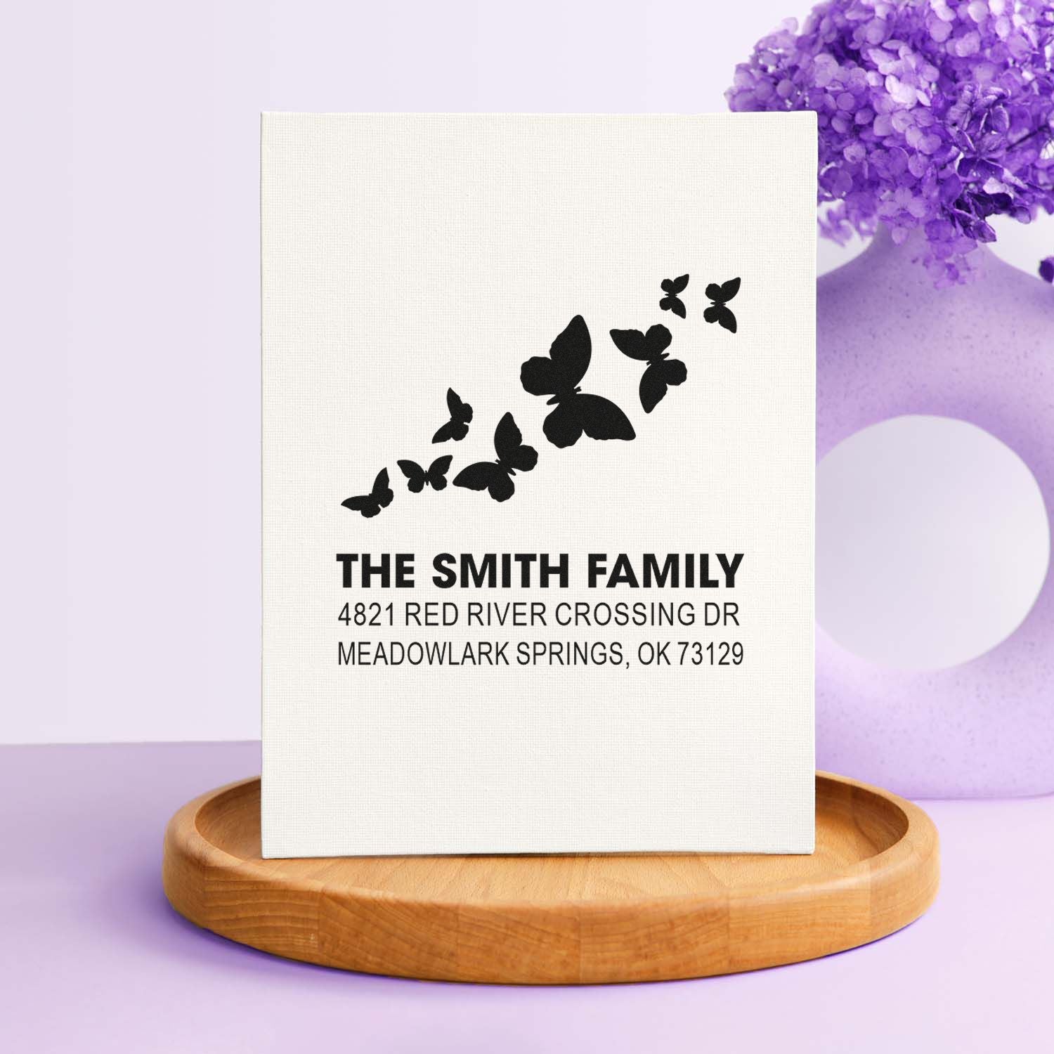 Custom butterfly family return address rubber stamp with personalized name and address, ideal for mailing, stationery, and wedding invitations