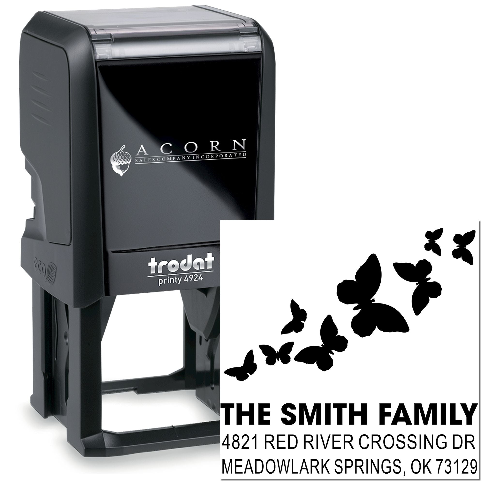 Custom self-inking rubber address stamp with butterfly design, The Smith Family name, and personalized return address for mail and envelopes.