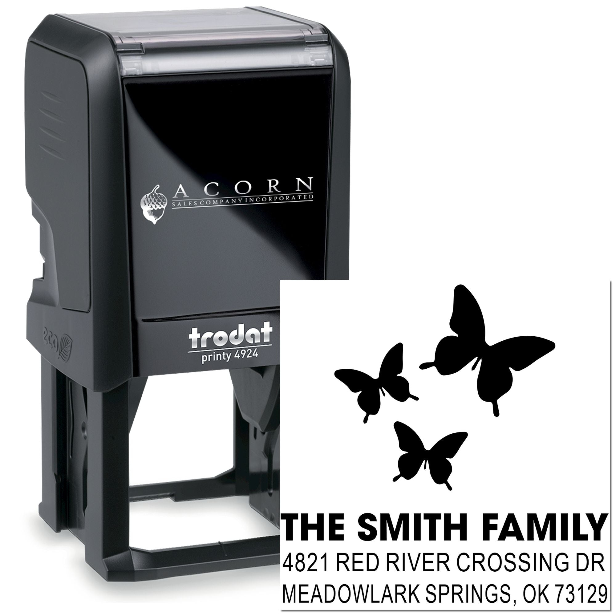 Custom self-inking rubber stamp with butterfly design, family name and address, black Trodat Printy 4924 for personalized mailing.