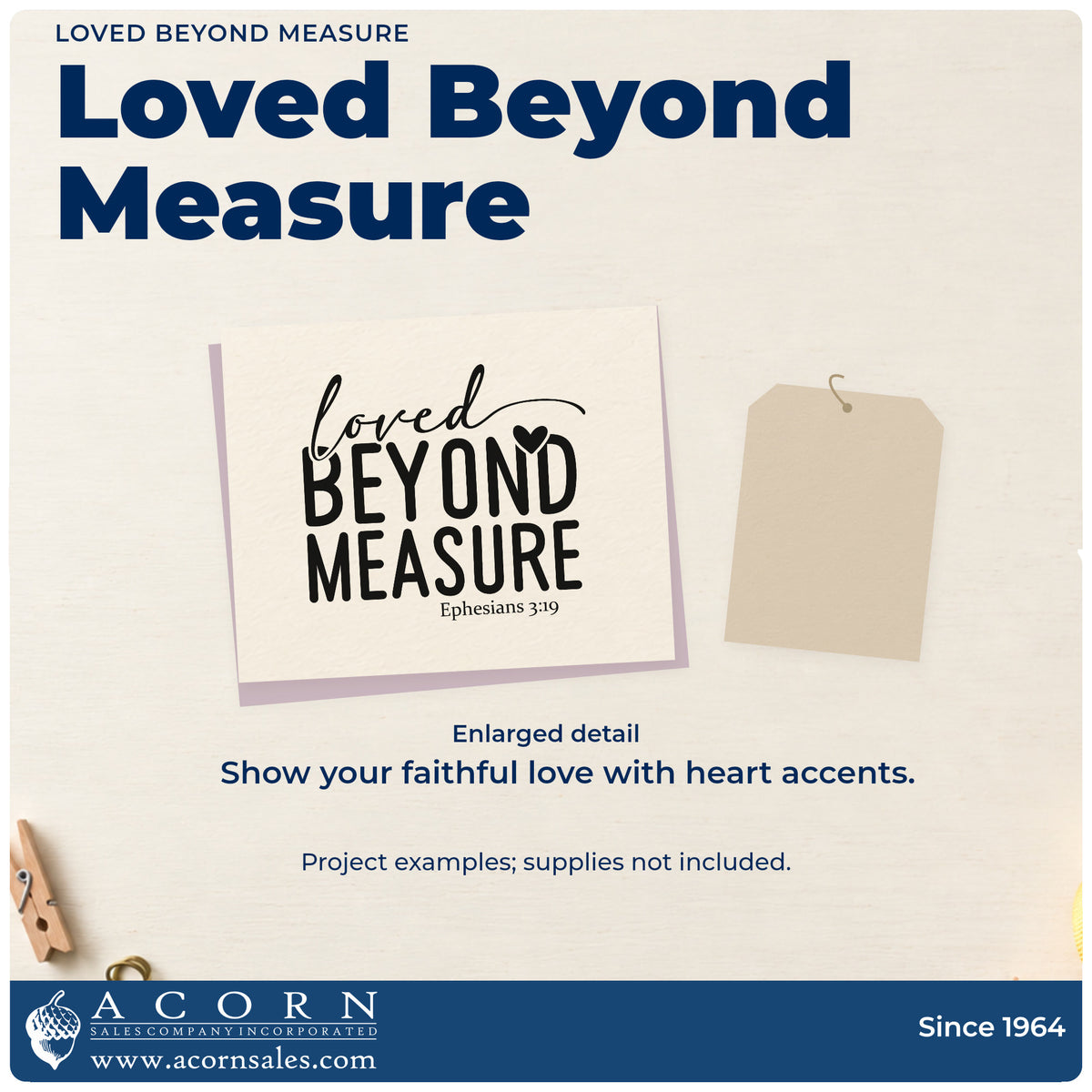 Enlarged detail of the Loved Beyond Measure With Hearts Craft Stamp – Self-Inking imprint. Script and tall block lettering reads "Loved beyond measure," with a heart and Ephesians 3:19.