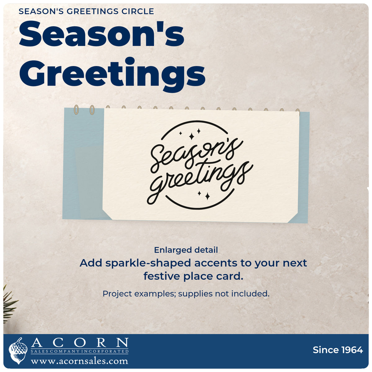 Enlarged detail of the Season's Greetings PSI Pre-Inked Stamp imprint. Script “Season's Greetings” sits between curved border lines with small sparkles.