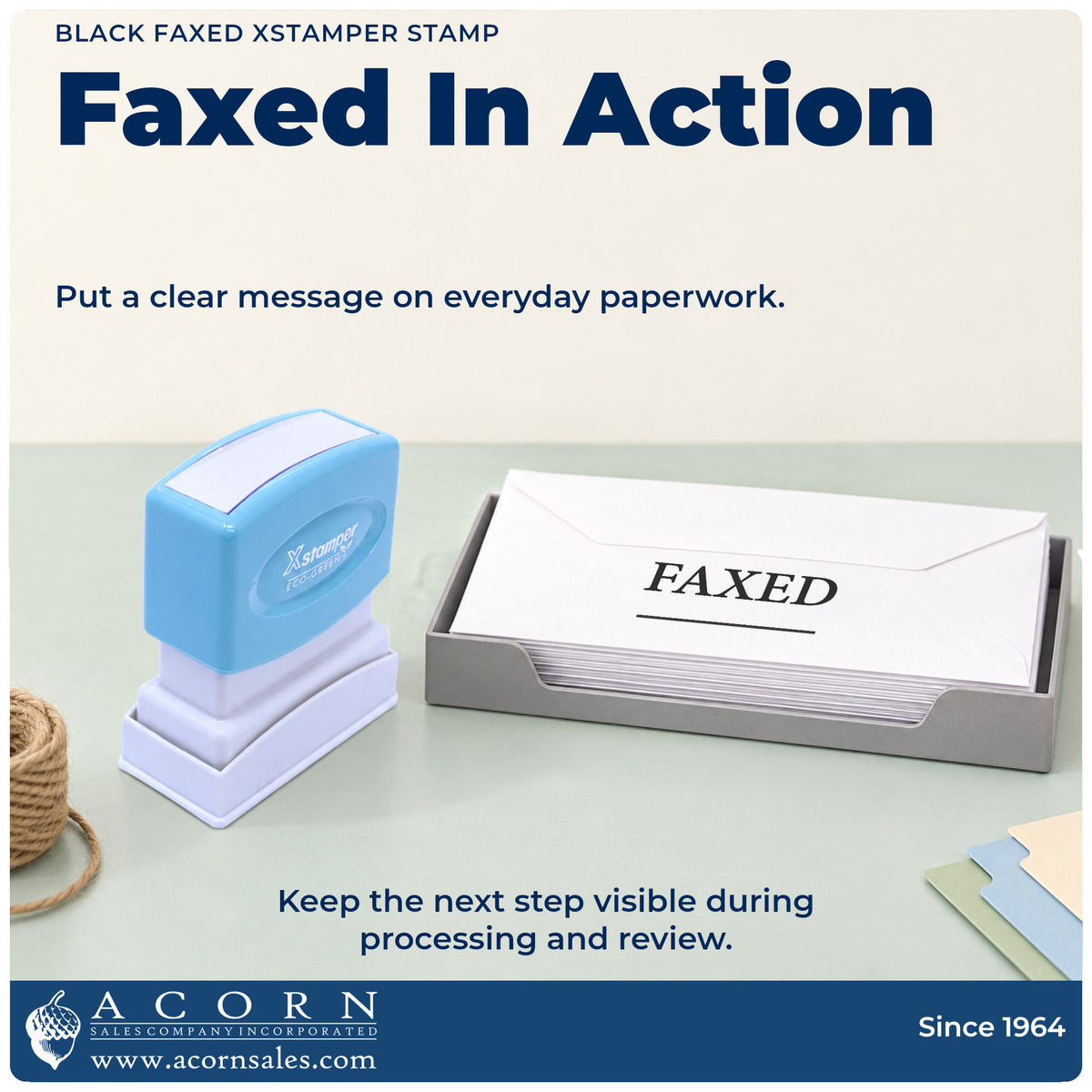 Xstamper Faxed Document Stamp – Black Pre-Inked being pressed to leave an imprint reading "Faxed"