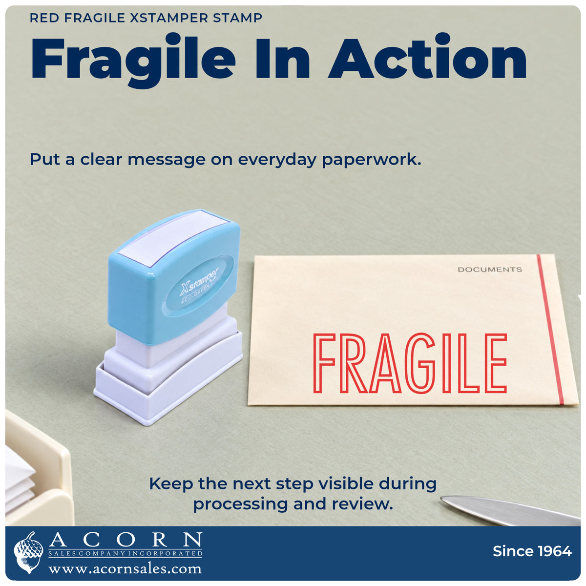 Xstamper Fragile Mailing Stamp – Red Pre-Inked being pressed to leave an imprint reading "Fragile"