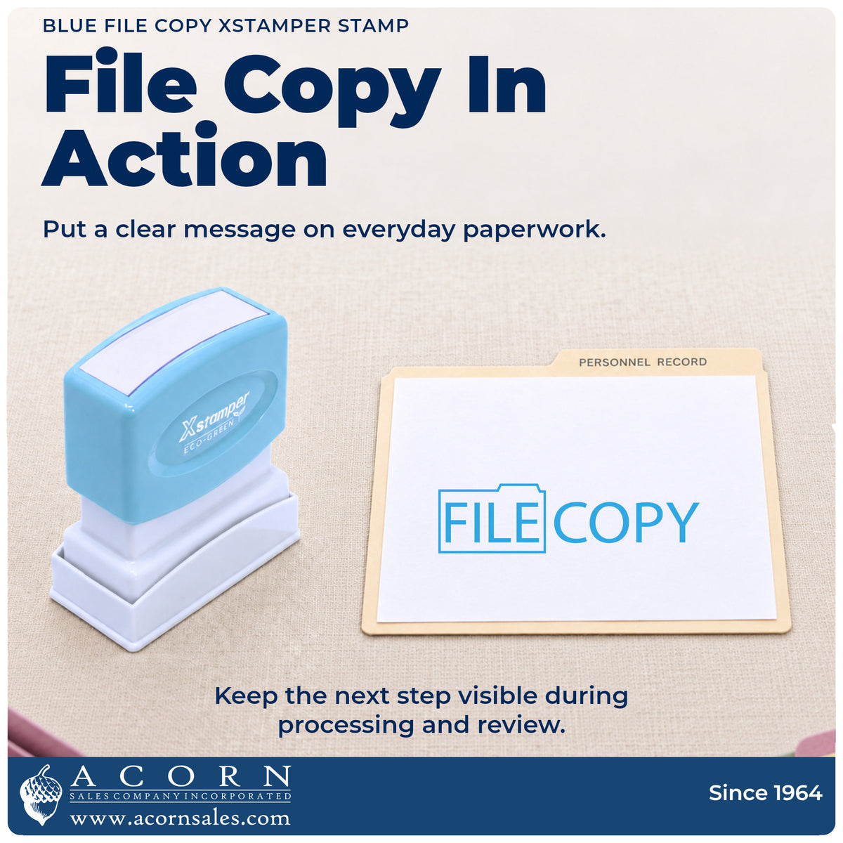 Blue File Copy Stamp being pressed to leave an imprint reading "File copy"