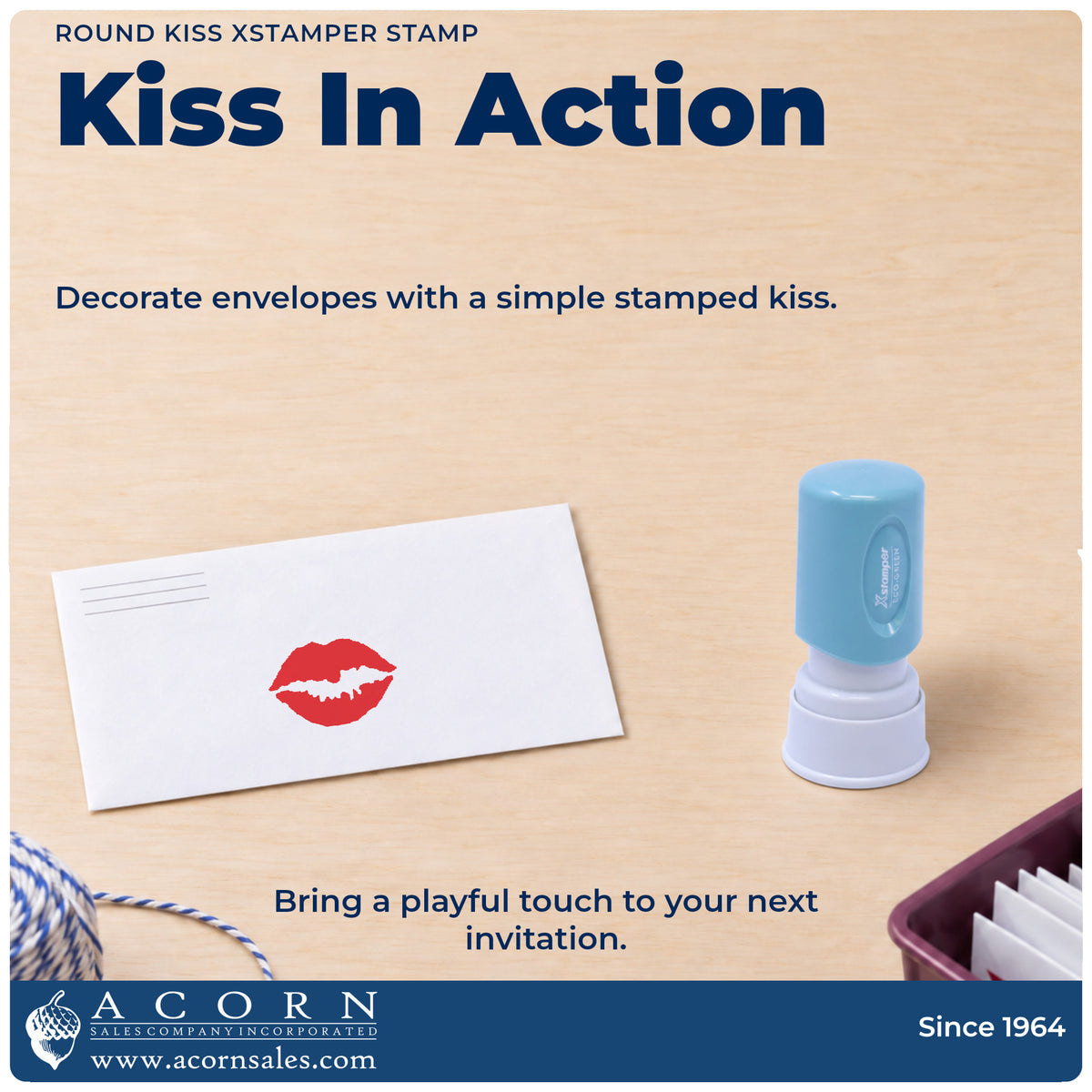 Kiss Stamp – Round Pre-Inked Xstamper being pressed to leave an imprint reading "Kiss"