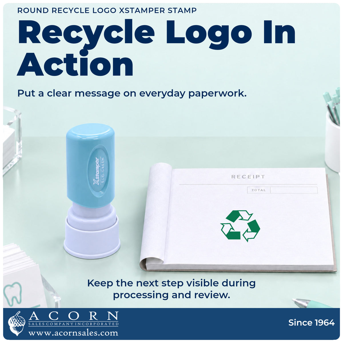 Round Recycle Logo Stamp being pressed to leave an imprint reading "Recycle logo"