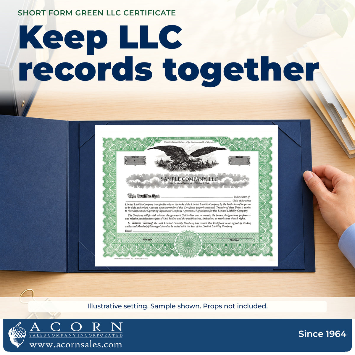 Office administrator organizes a printed green LLC certificate with company records.