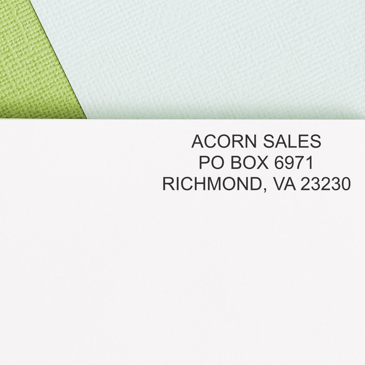 Close-up of Acorn Sales mailing envelope with PO Box 6971, Richmond, VA 23230 address label.