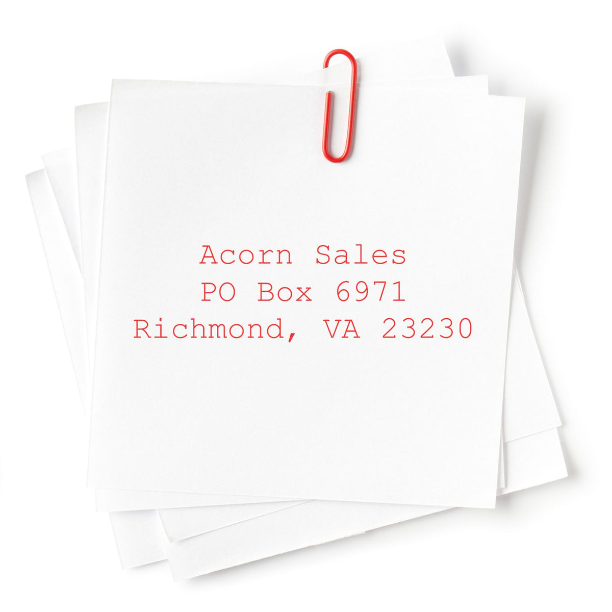 Stack of white business documents clipped with a red paperclip, showing Acorn Sales PO Box 6971, Richmond, VA 23230.