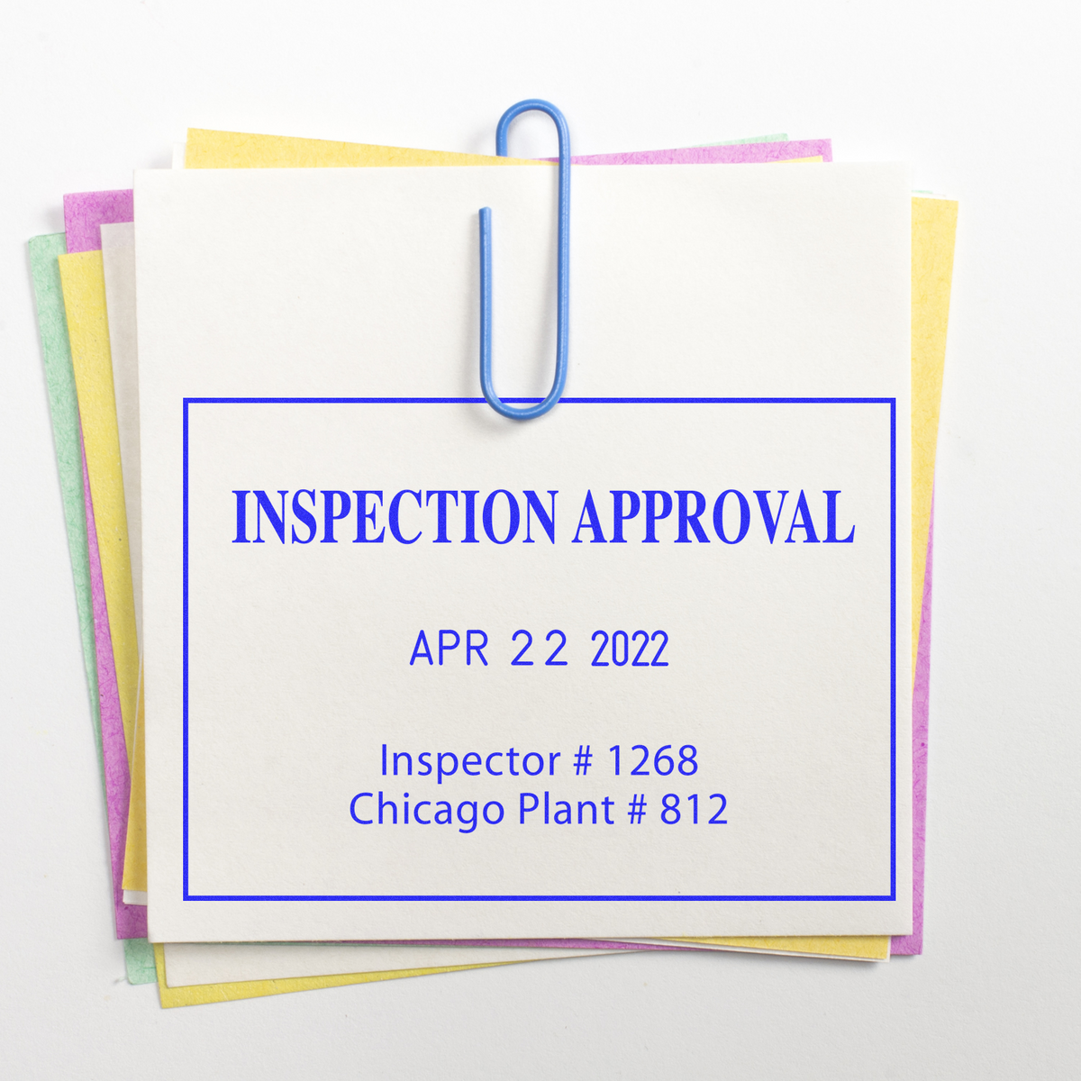 Inspection approval stamp on stacked documents, dated Apr 22 2022, Inspector #1268, Chicago Plant #812.